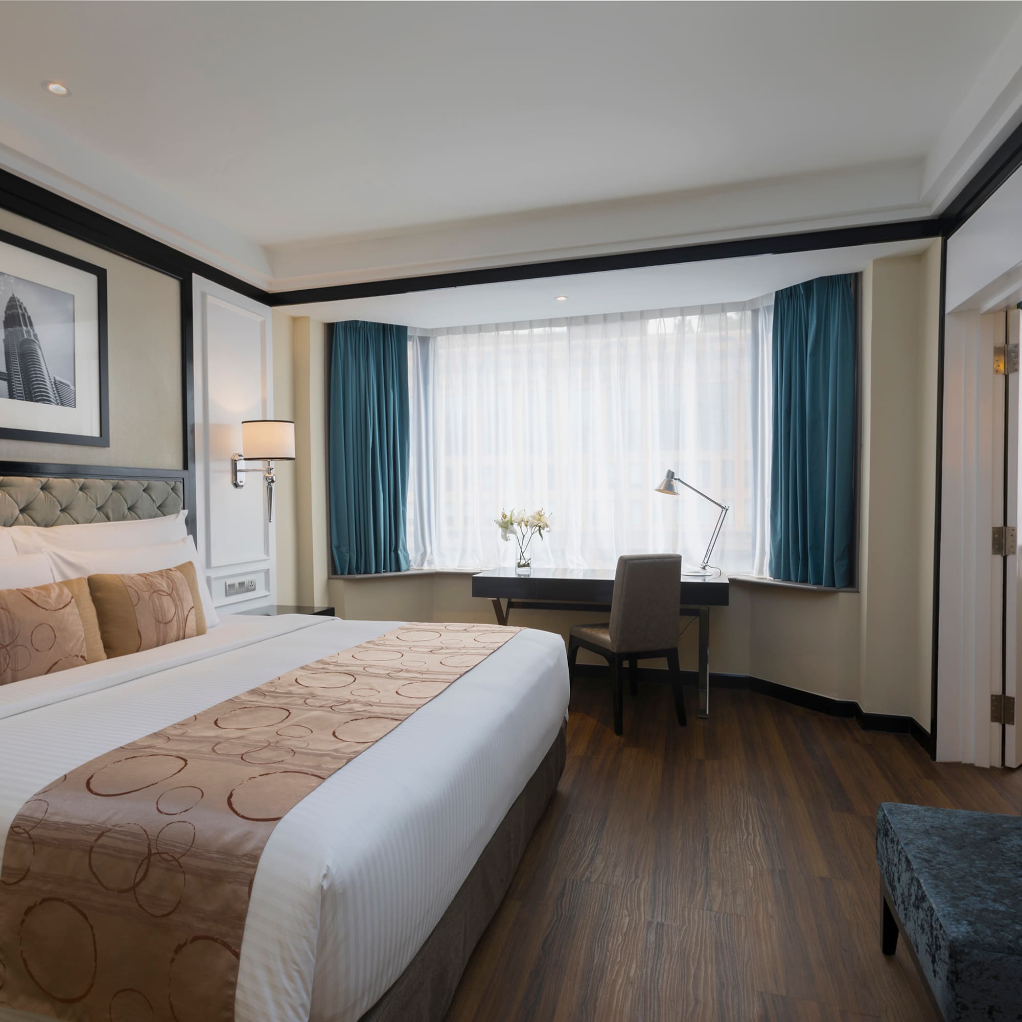 a bedroom with a bed and a desk