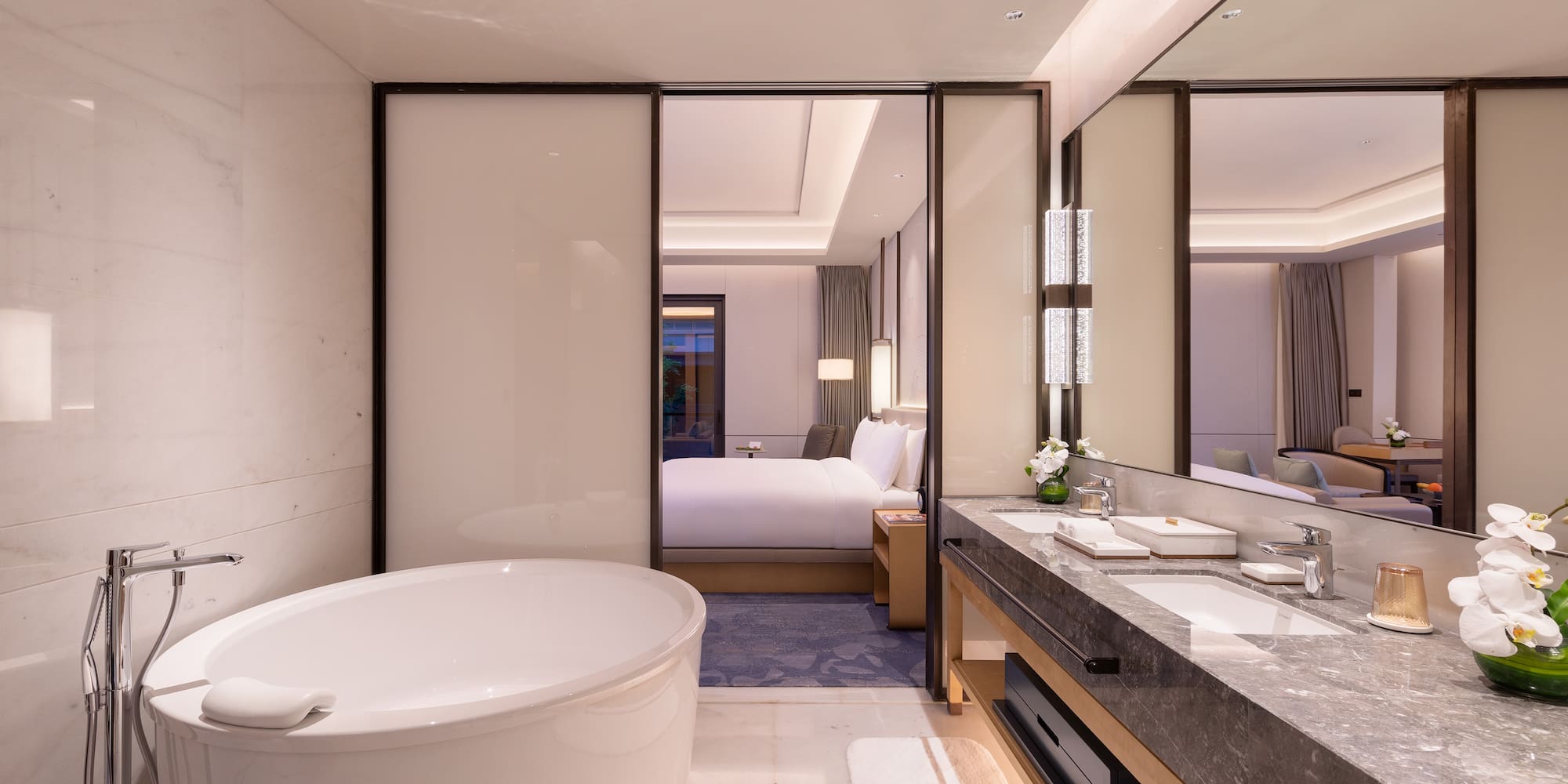 a bathroom with a tub and sink