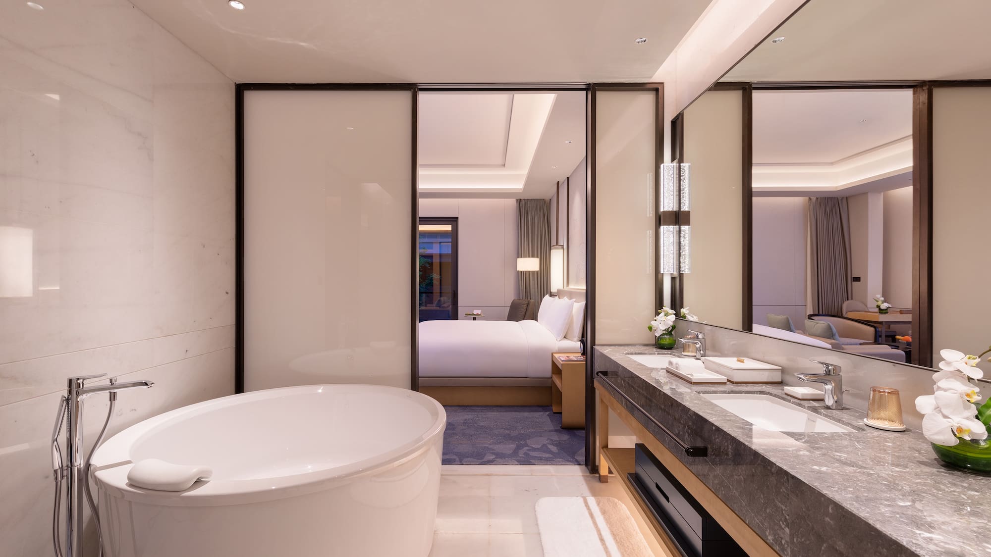 a bathroom with a tub and sink