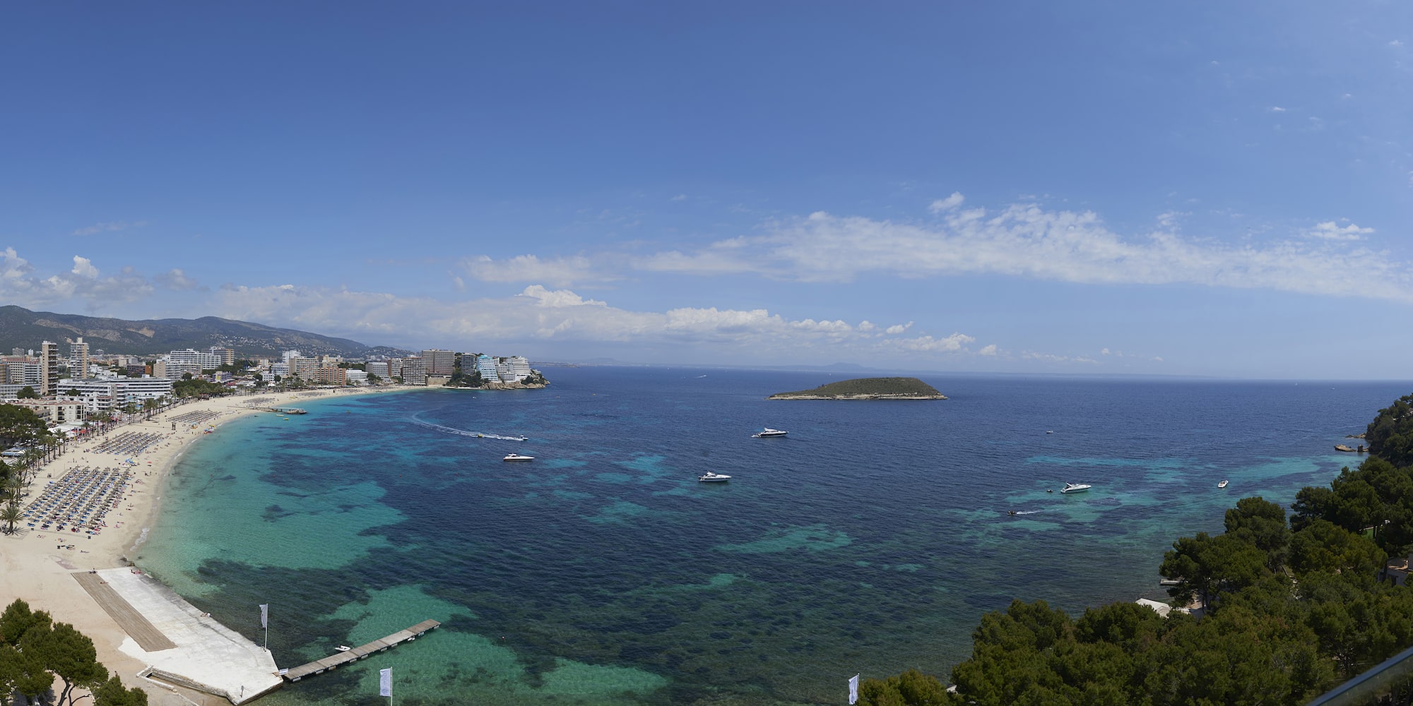 a body of water with buildings and boats