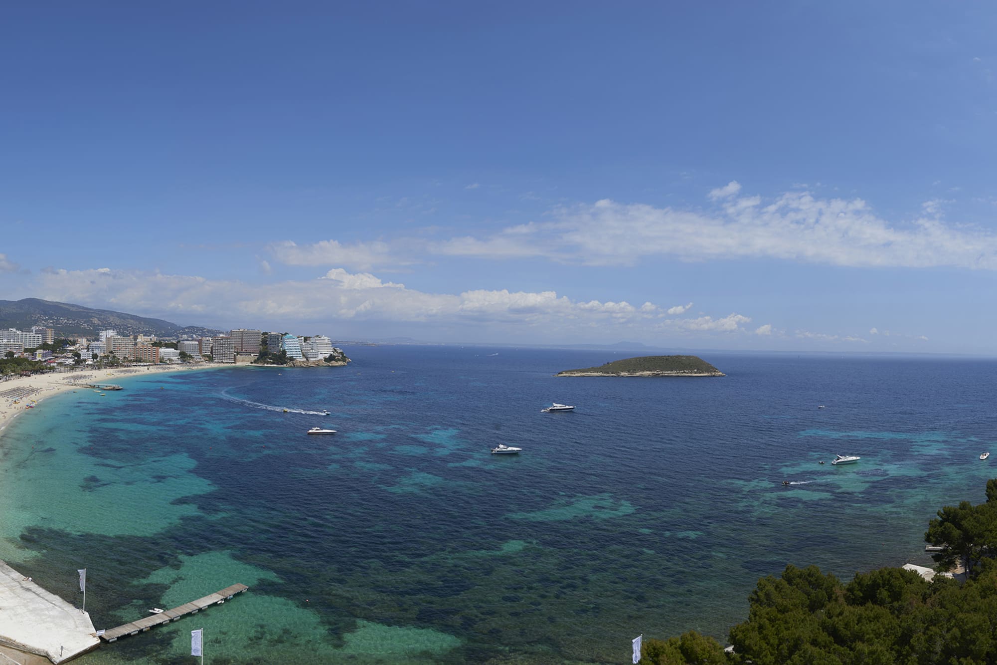 a body of water with buildings and boats