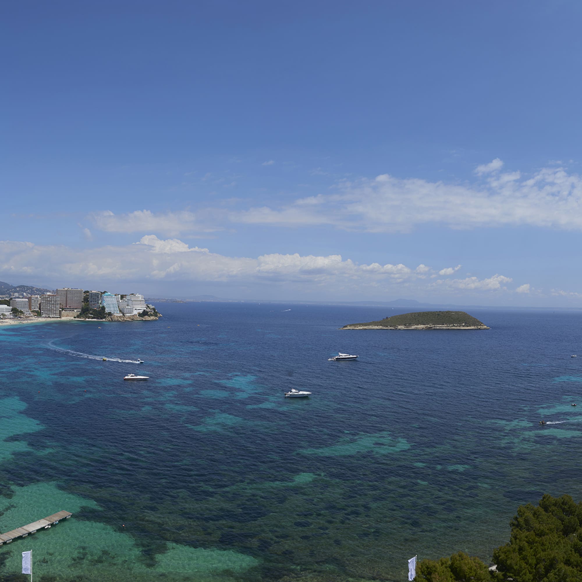 a body of water with buildings and boats