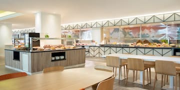 a restaurant with a buffet and food