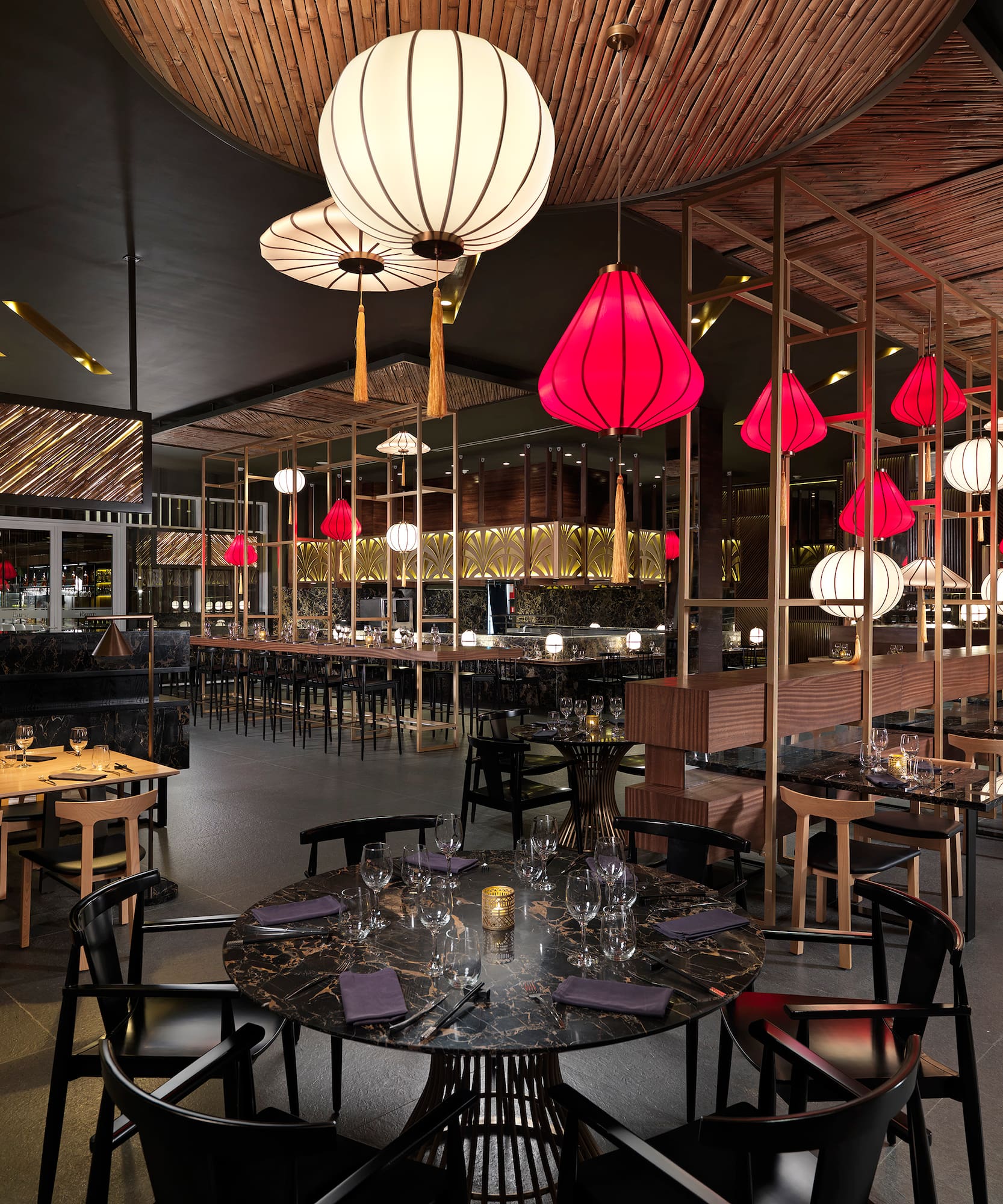 a restaurant with tables and chairs