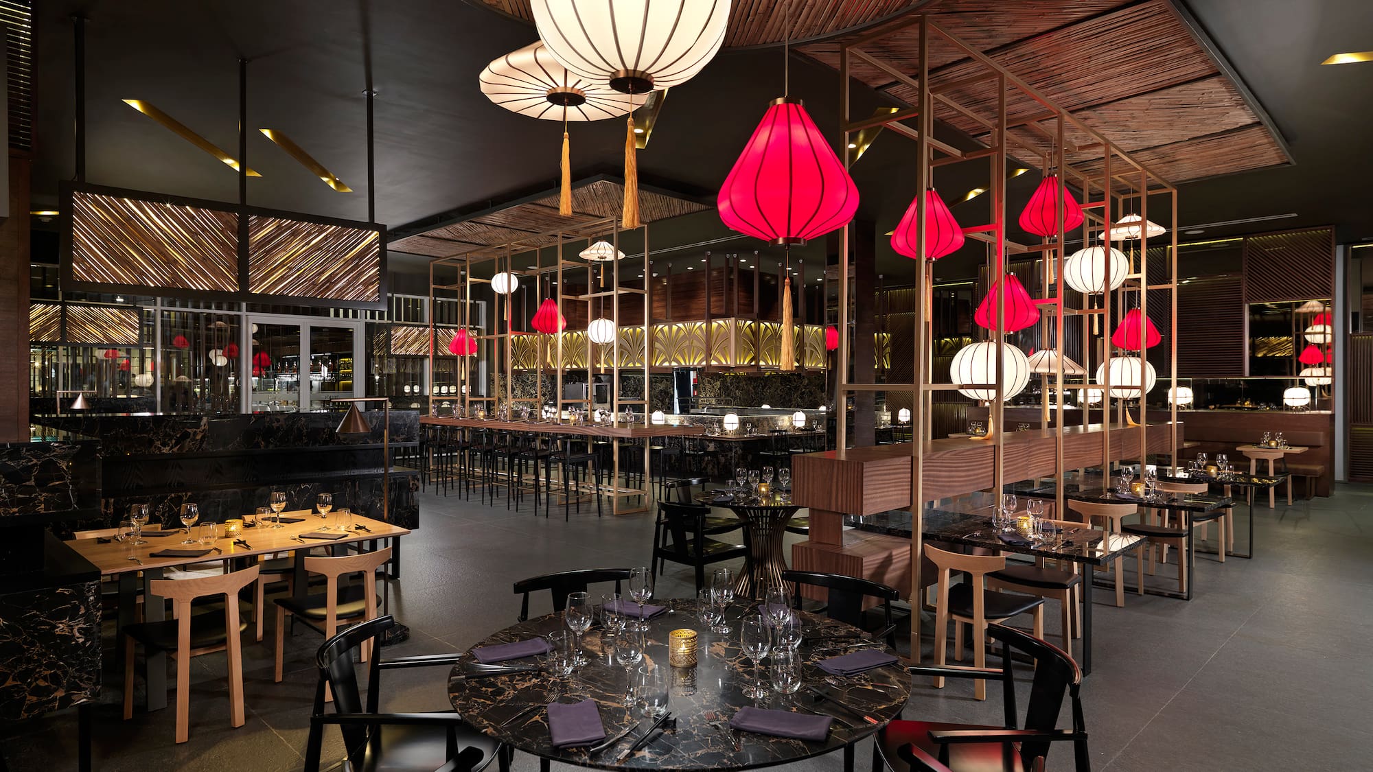 a restaurant with tables and chairs