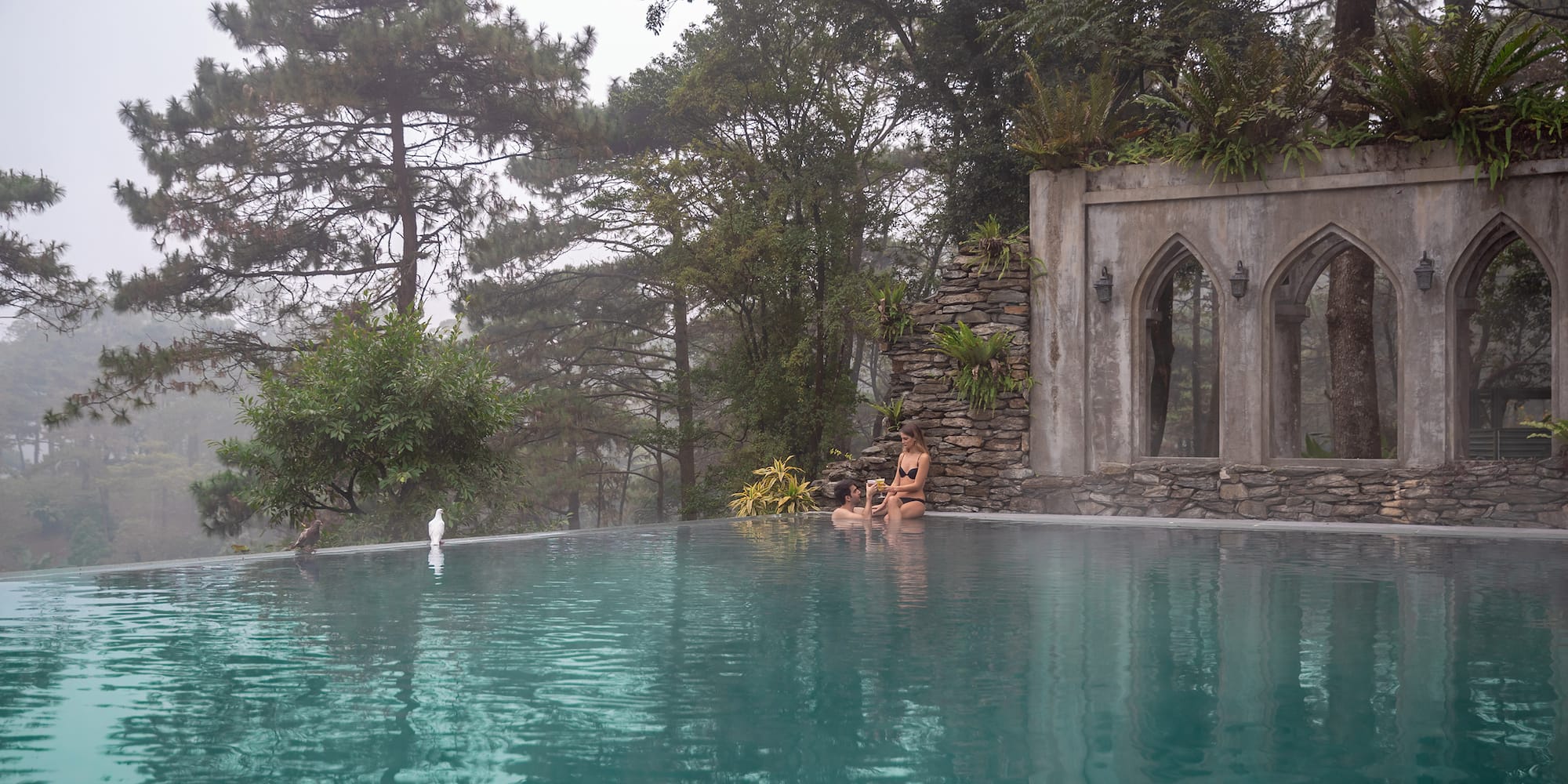 people sitting in a pool