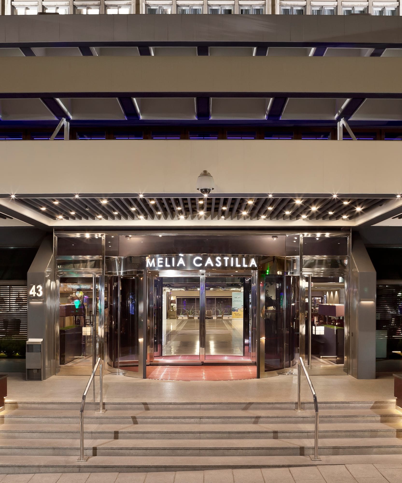 a building with stairs leading to the entrance