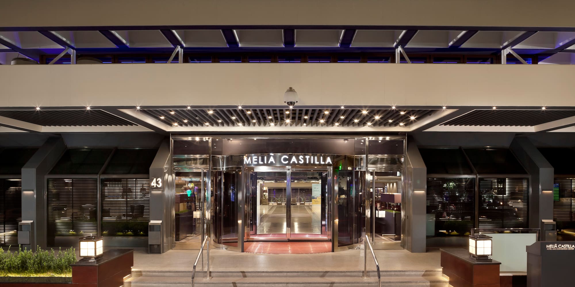 a building with stairs leading to the entrance