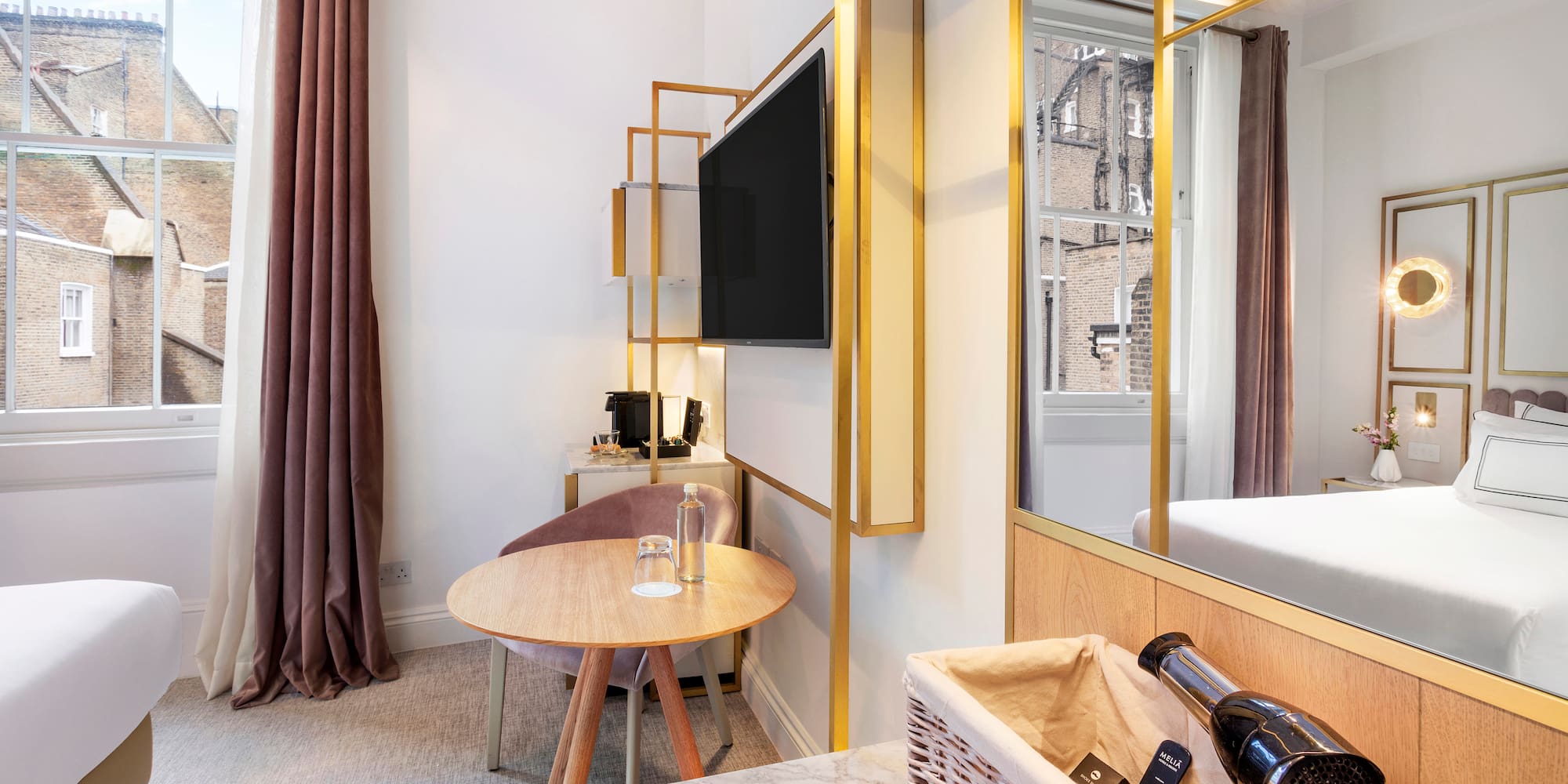 a room with a television and a table