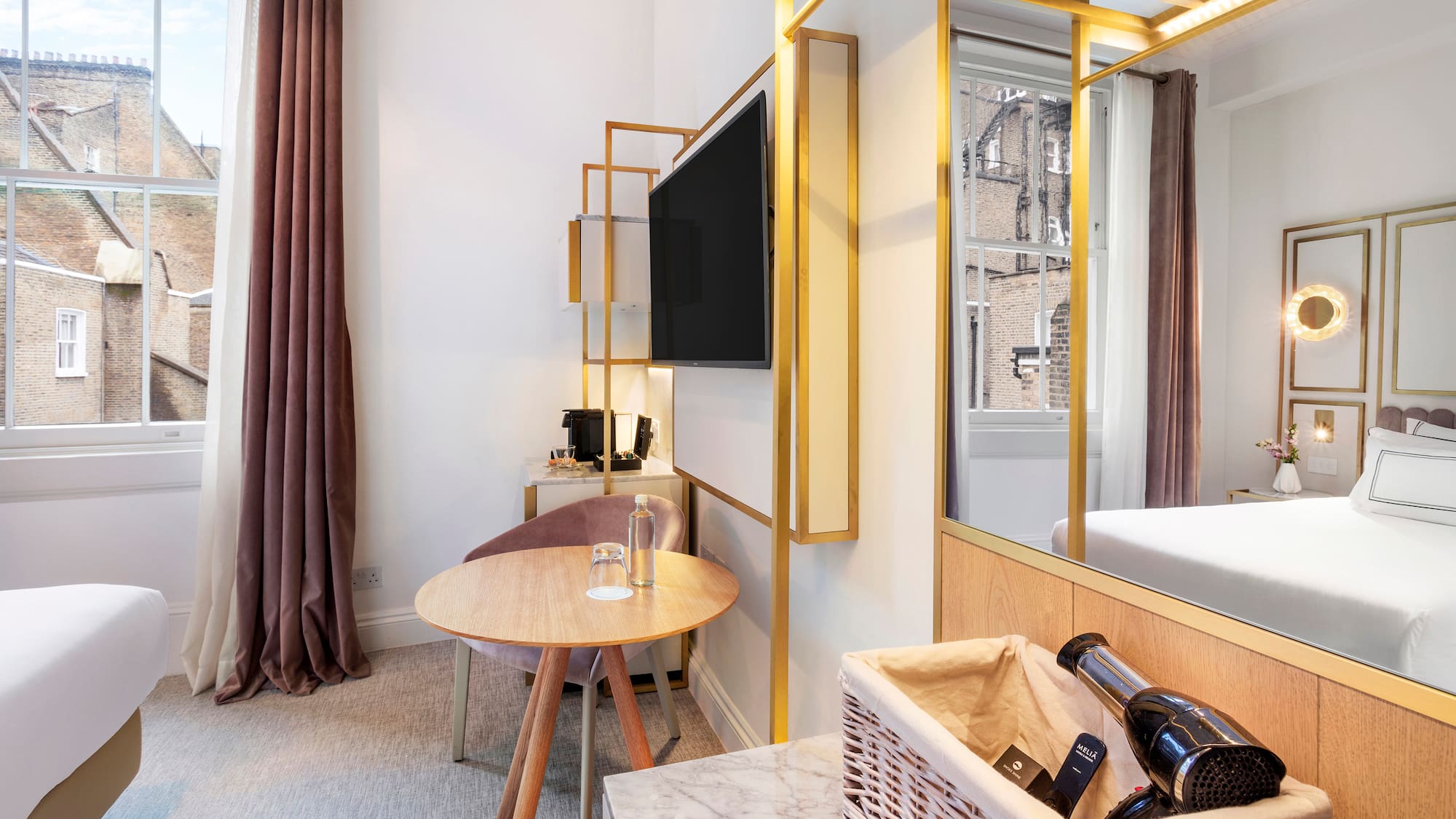 a room with a television and a table