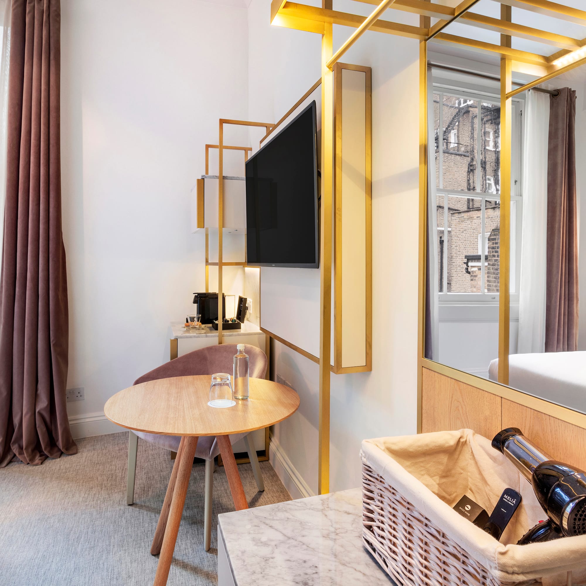 a room with a television and a table