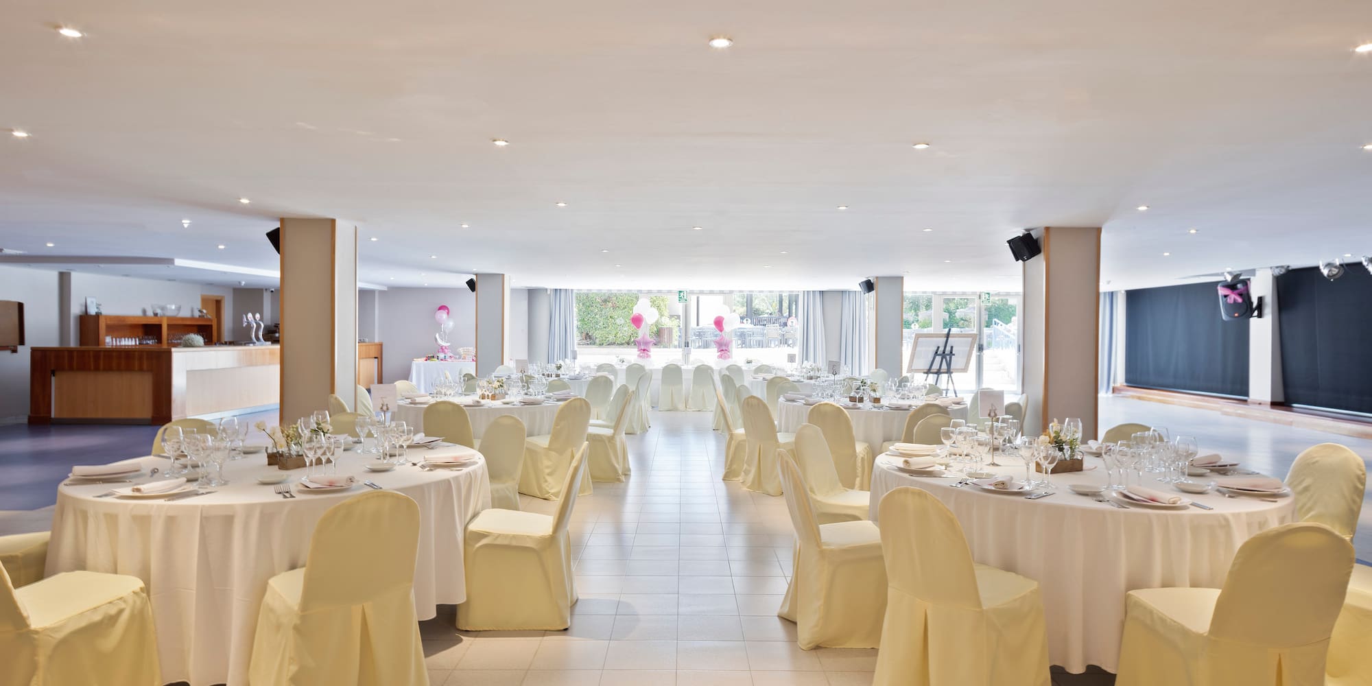 a room with tables and chairs