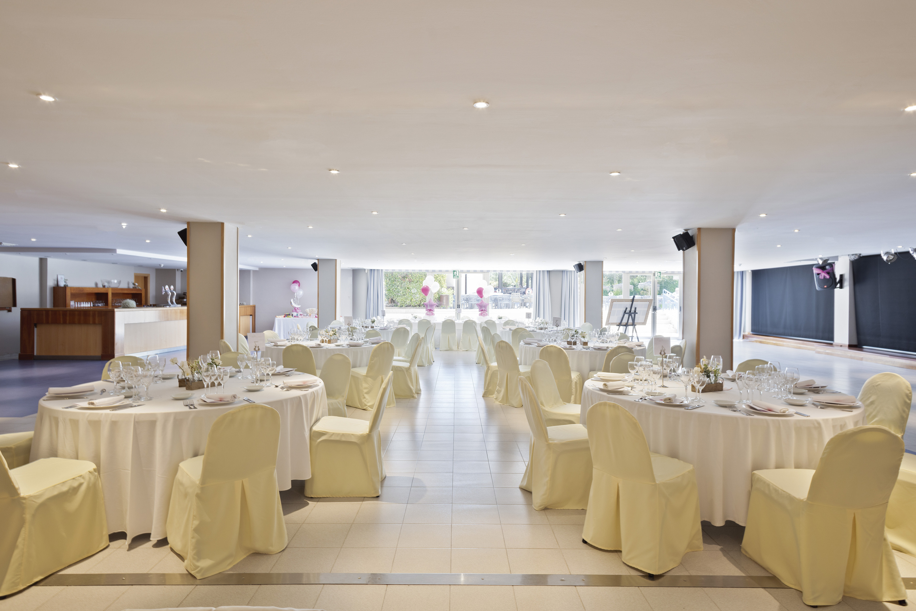 a room with tables and chairs