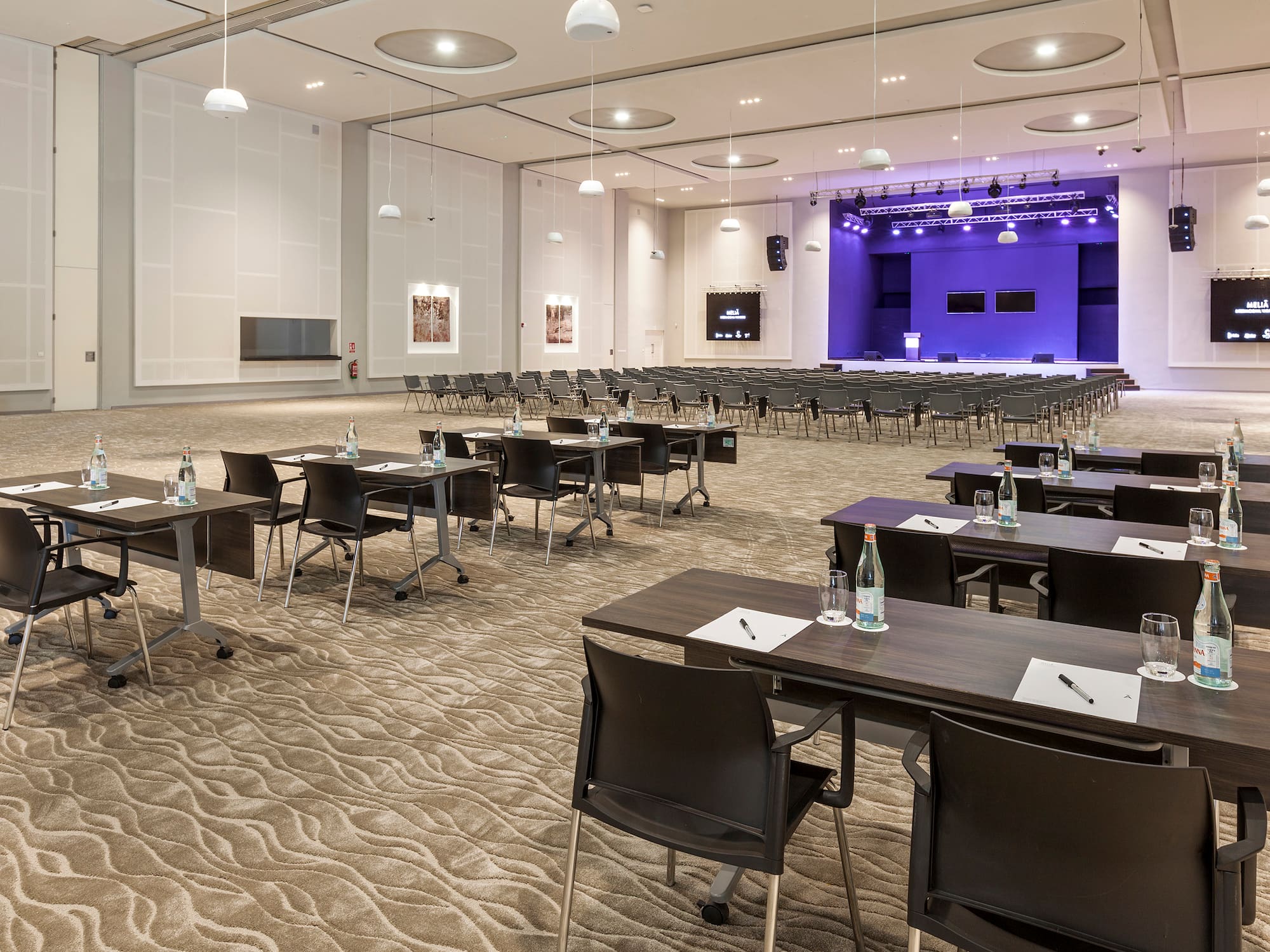 a room with tables and chairs