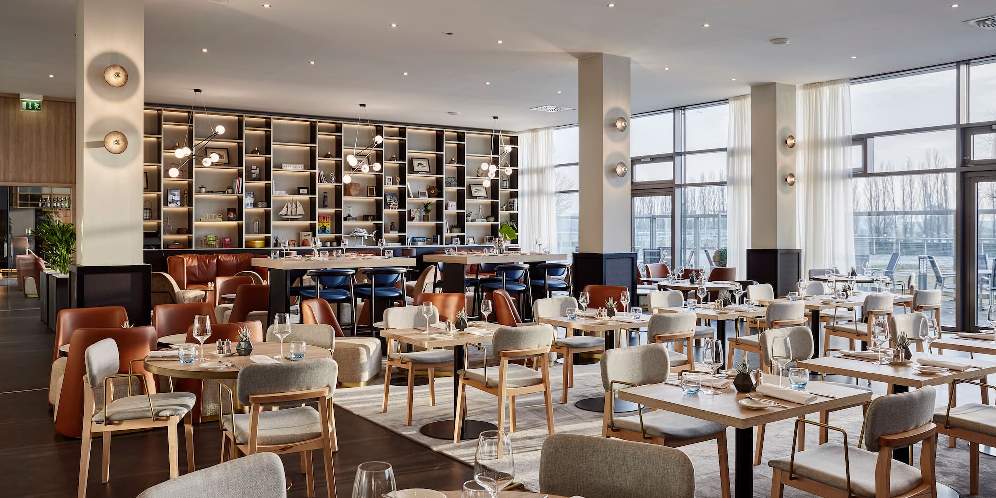 a restaurant with tables and chairs