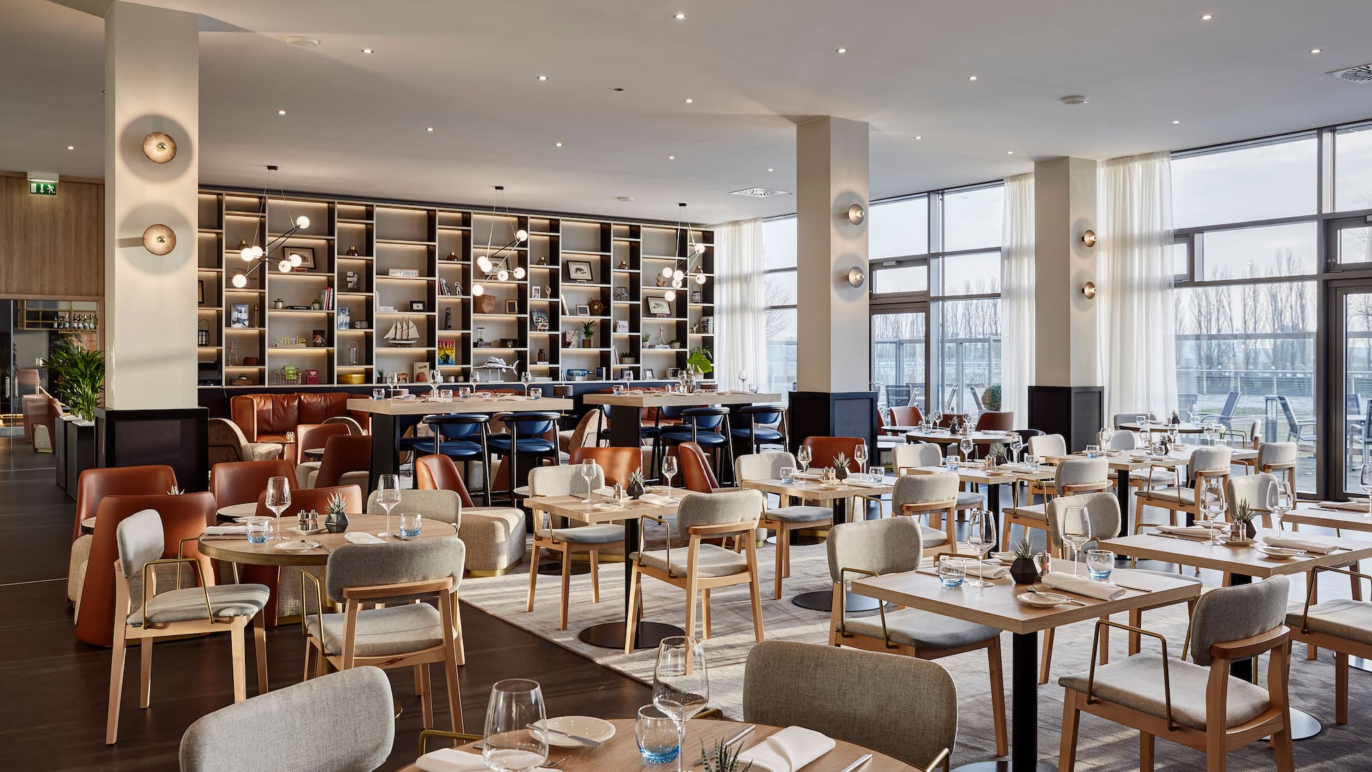 a restaurant with tables and chairs