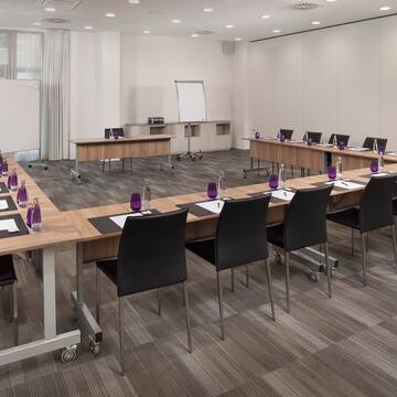 a room with tables and chairs