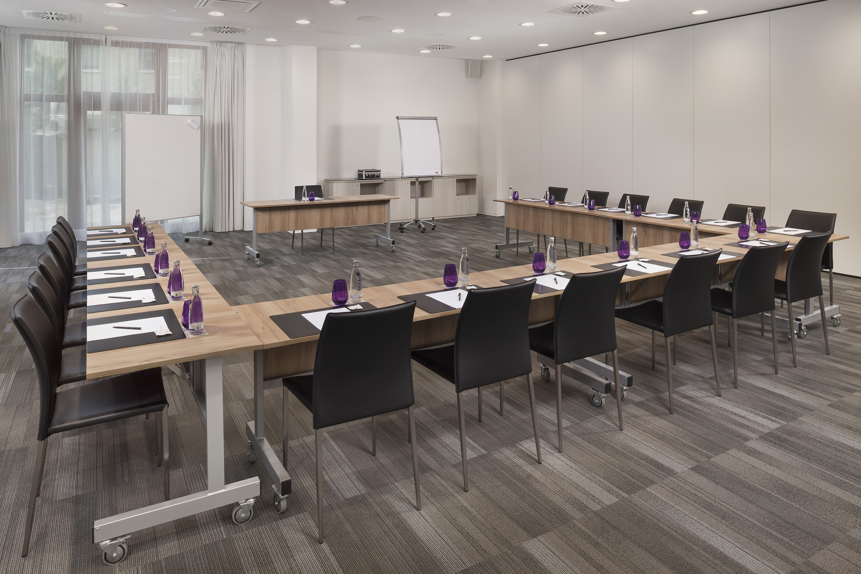 a room with tables and chairs