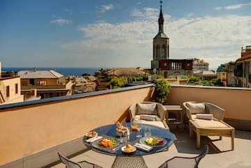 a table with food on it on a rooftop