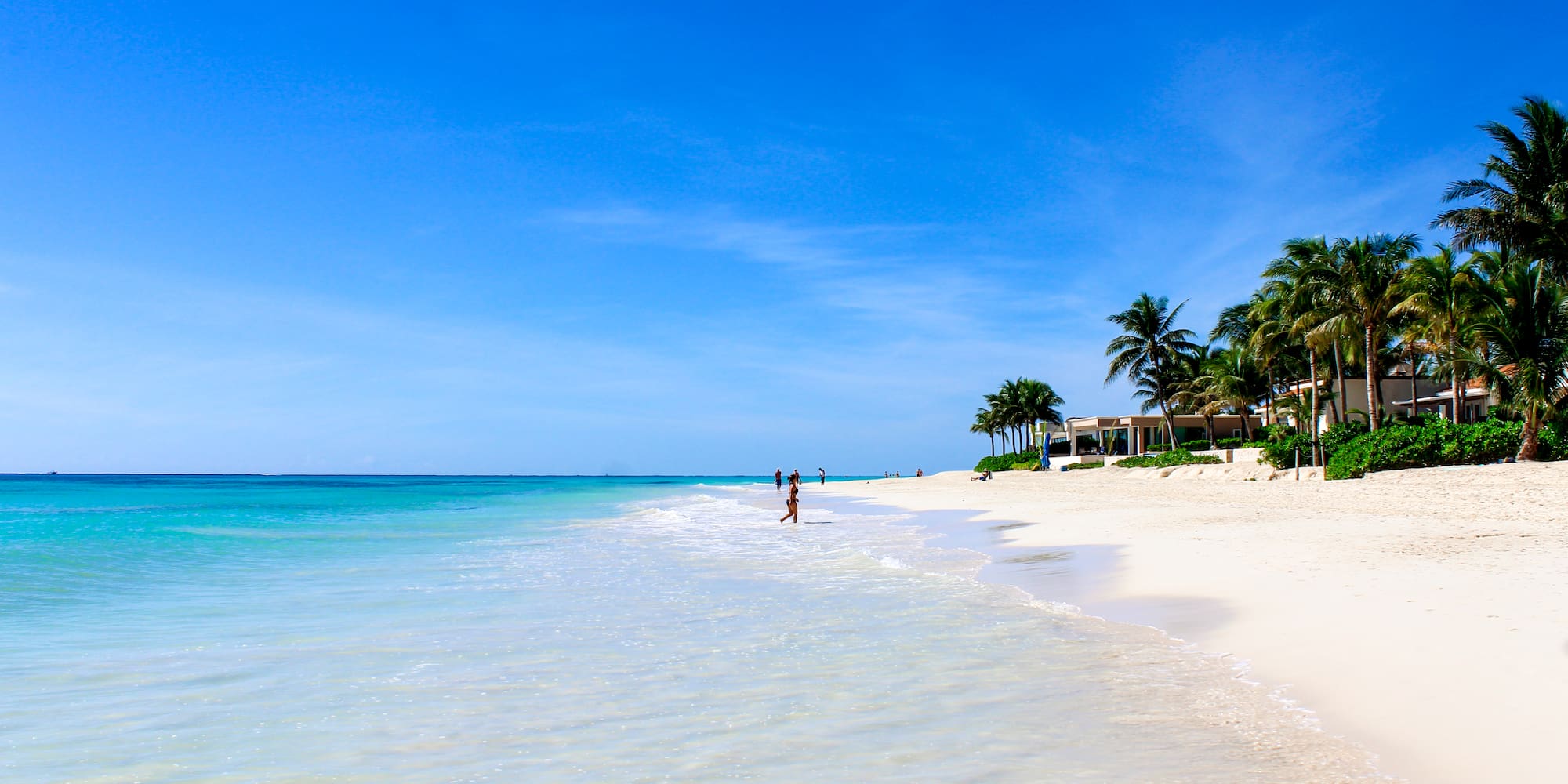 a person walking on a beach