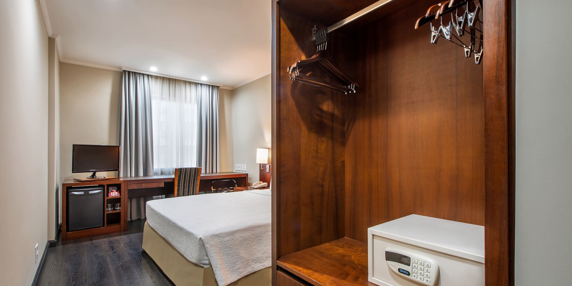 a room with a bed and a closet