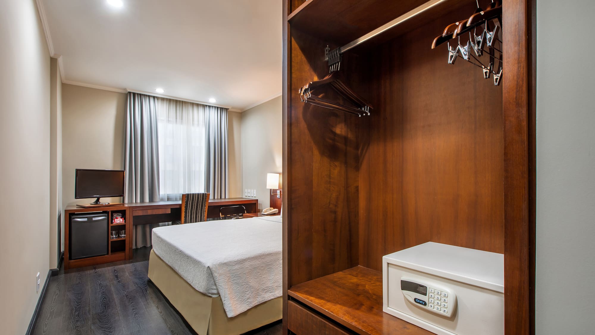 a room with a bed and a closet