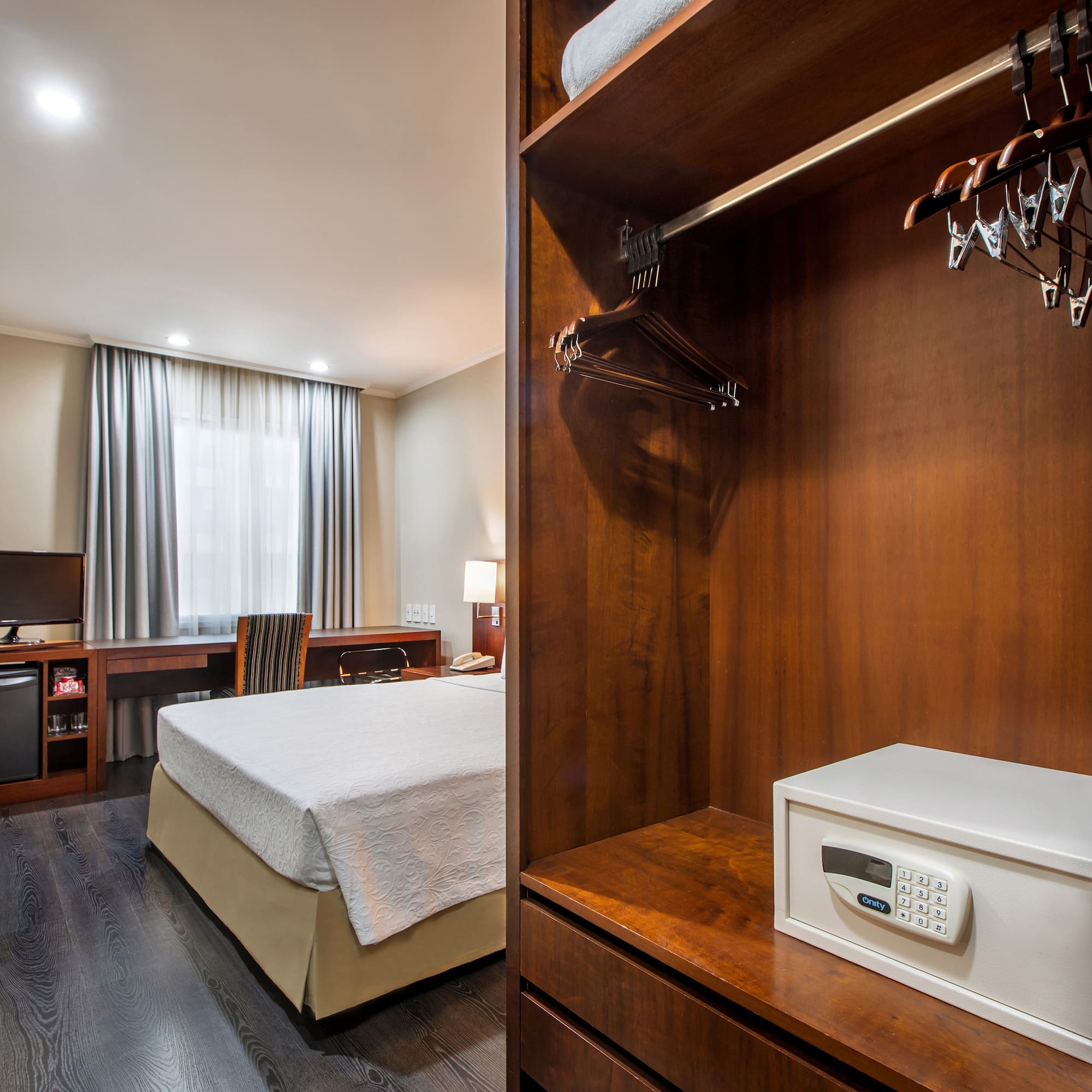 a room with a bed and a closet