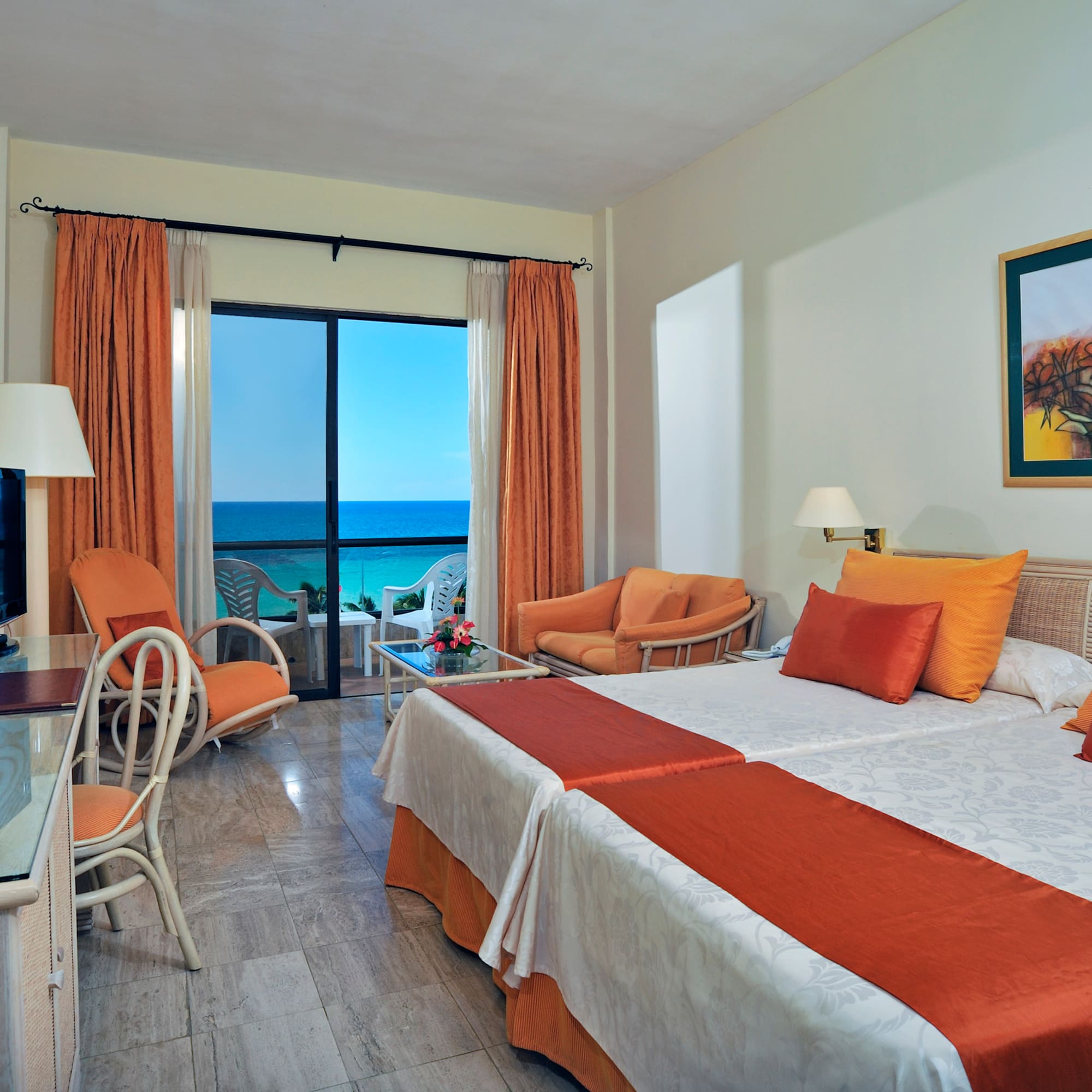 a room with a television and a bed