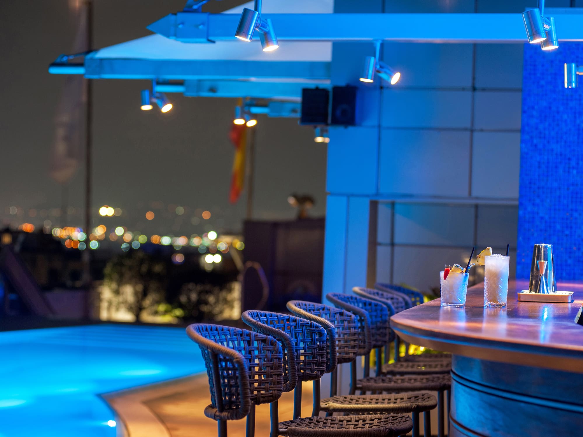 a bar with drinks on a table