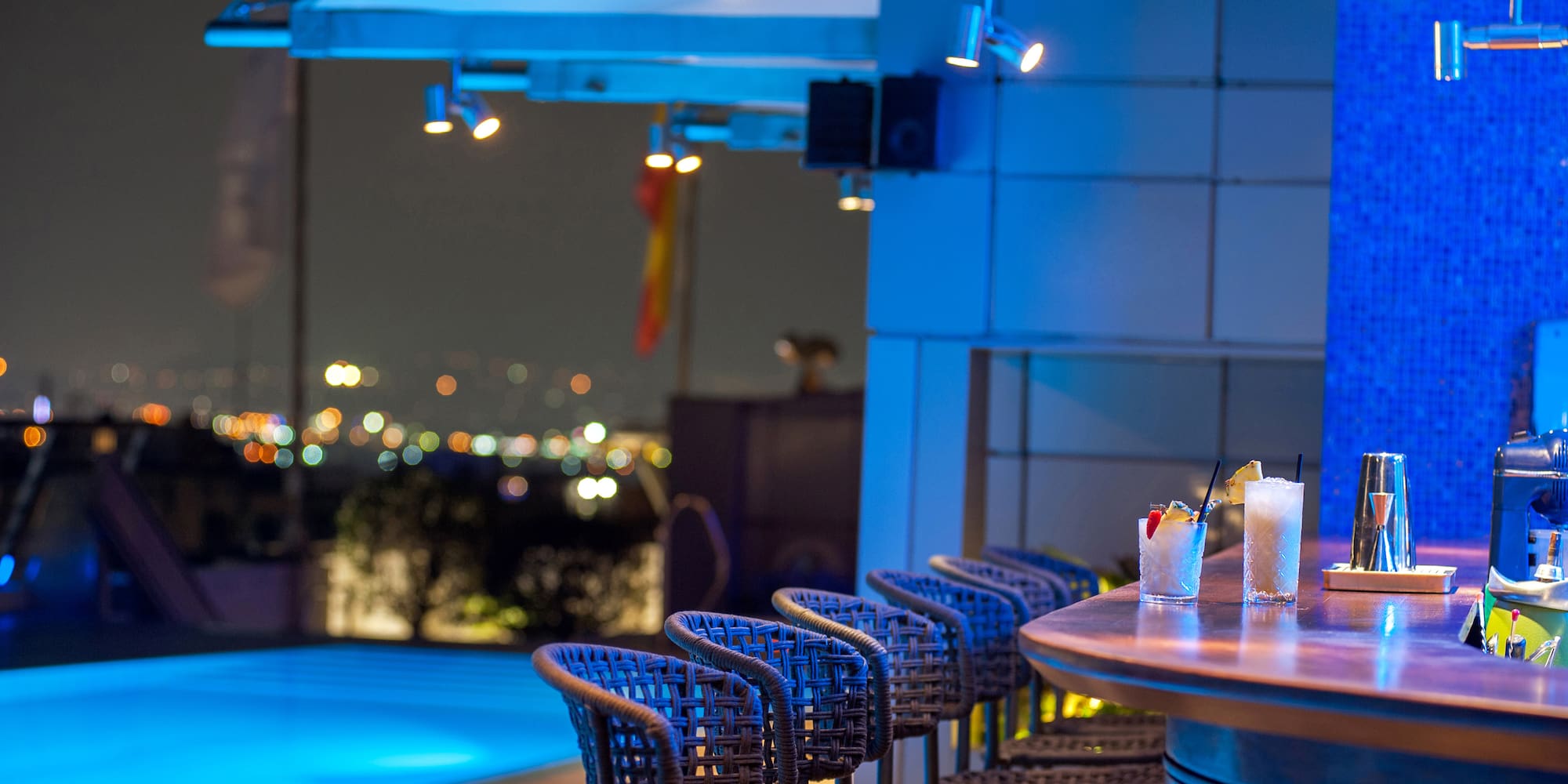 a bar with drinks on a table