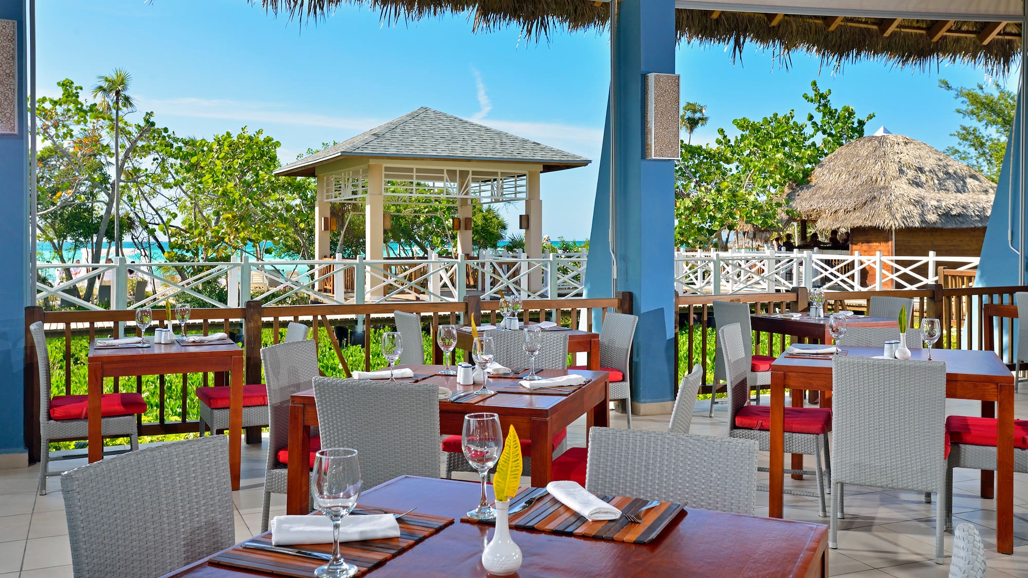 a restaurant with tables and chairs