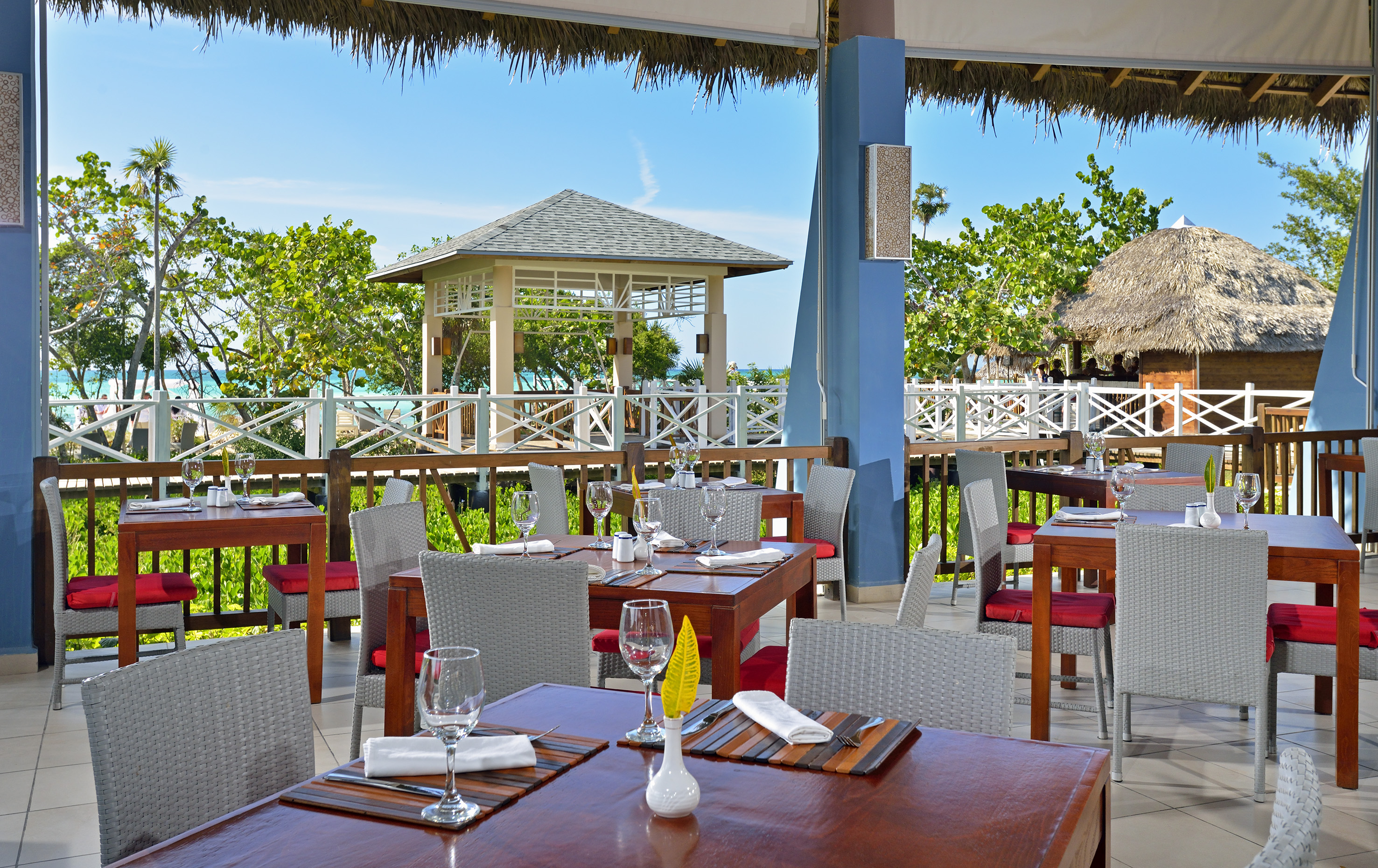 a restaurant with tables and chairs