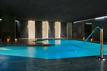 a pool with a water hose