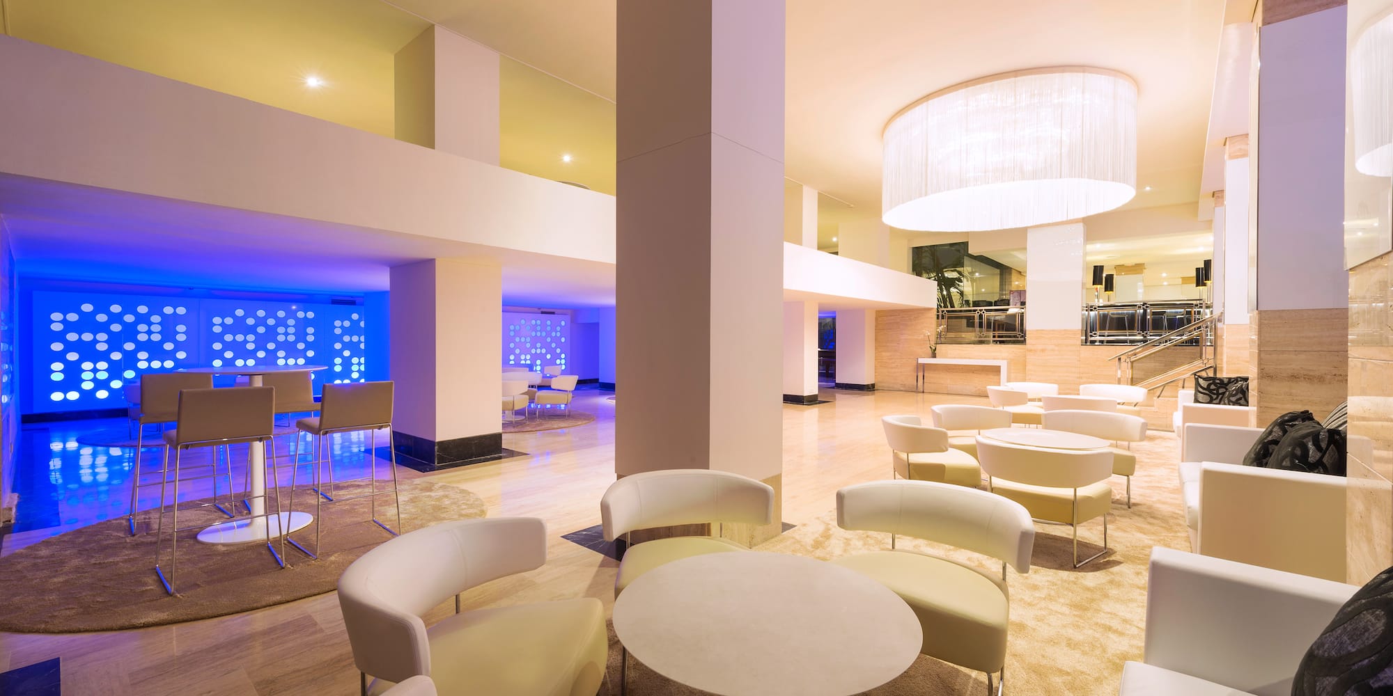 a room with tables and chairs