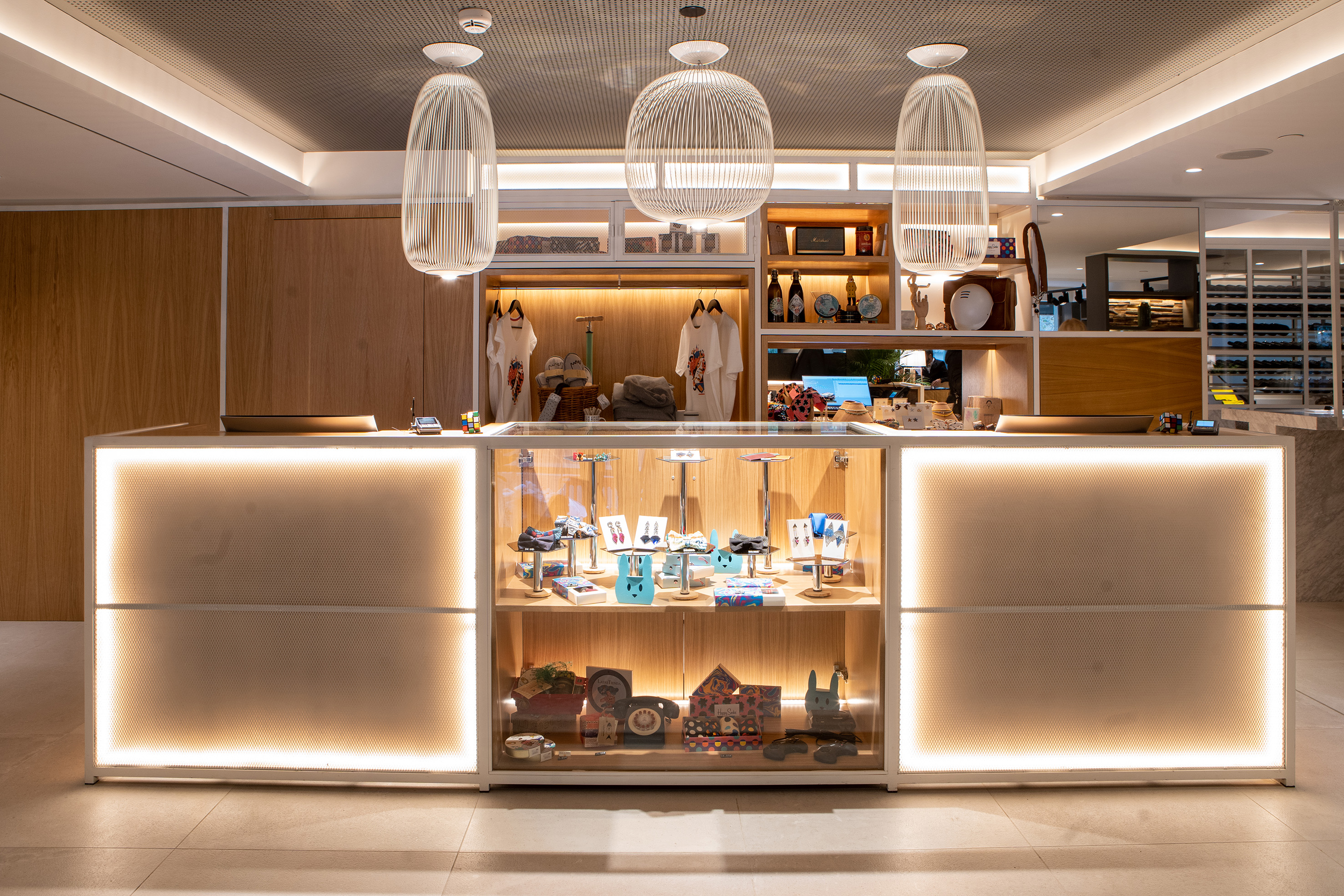 a display case with lights and objects on it