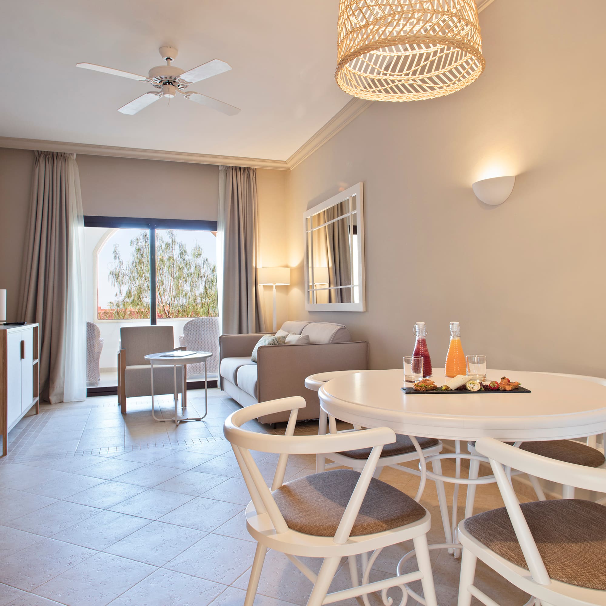 a room with a table and chairs