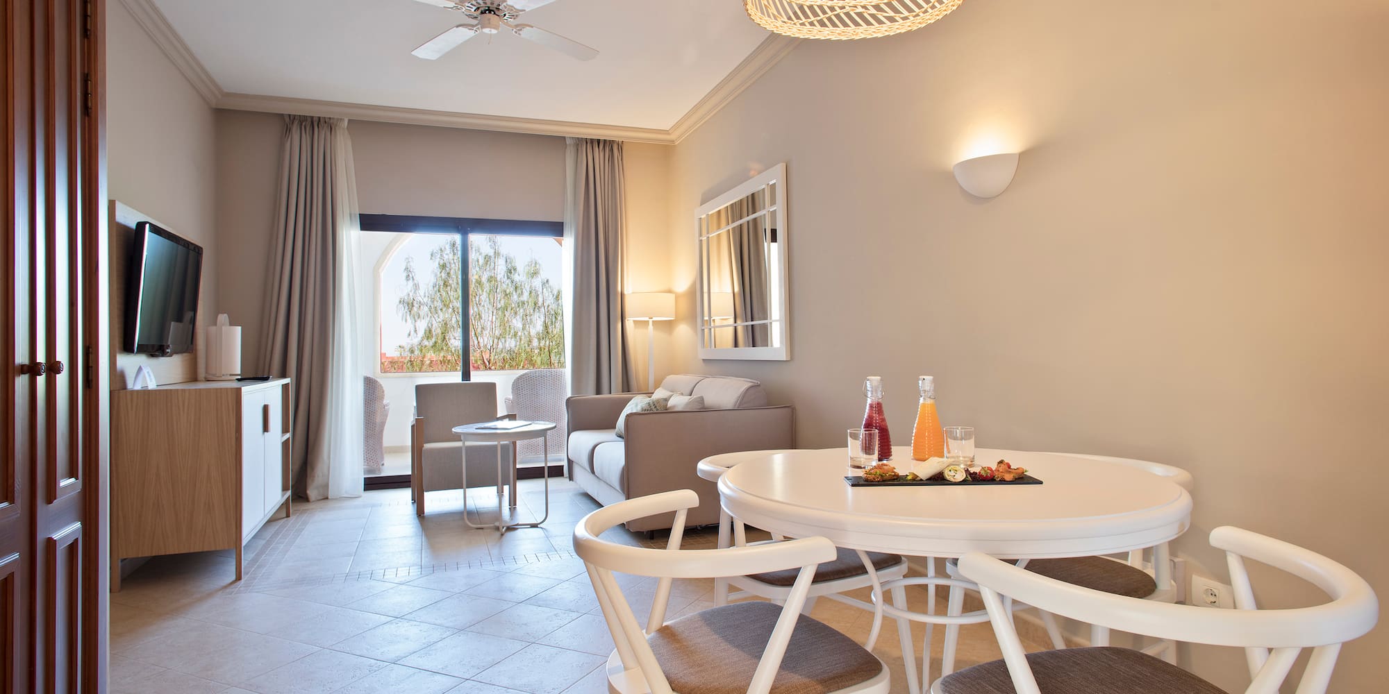 a room with a table and chairs