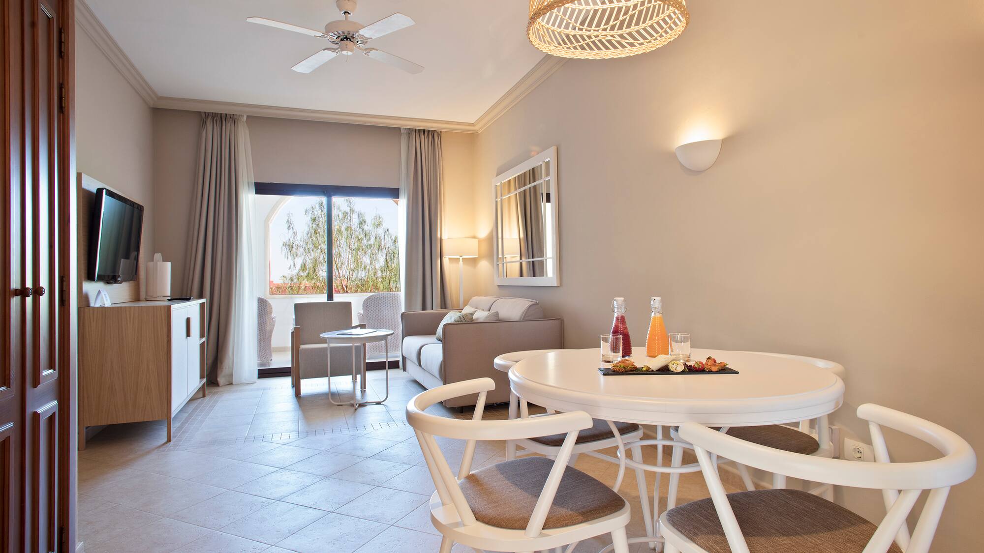 a room with a table and chairs