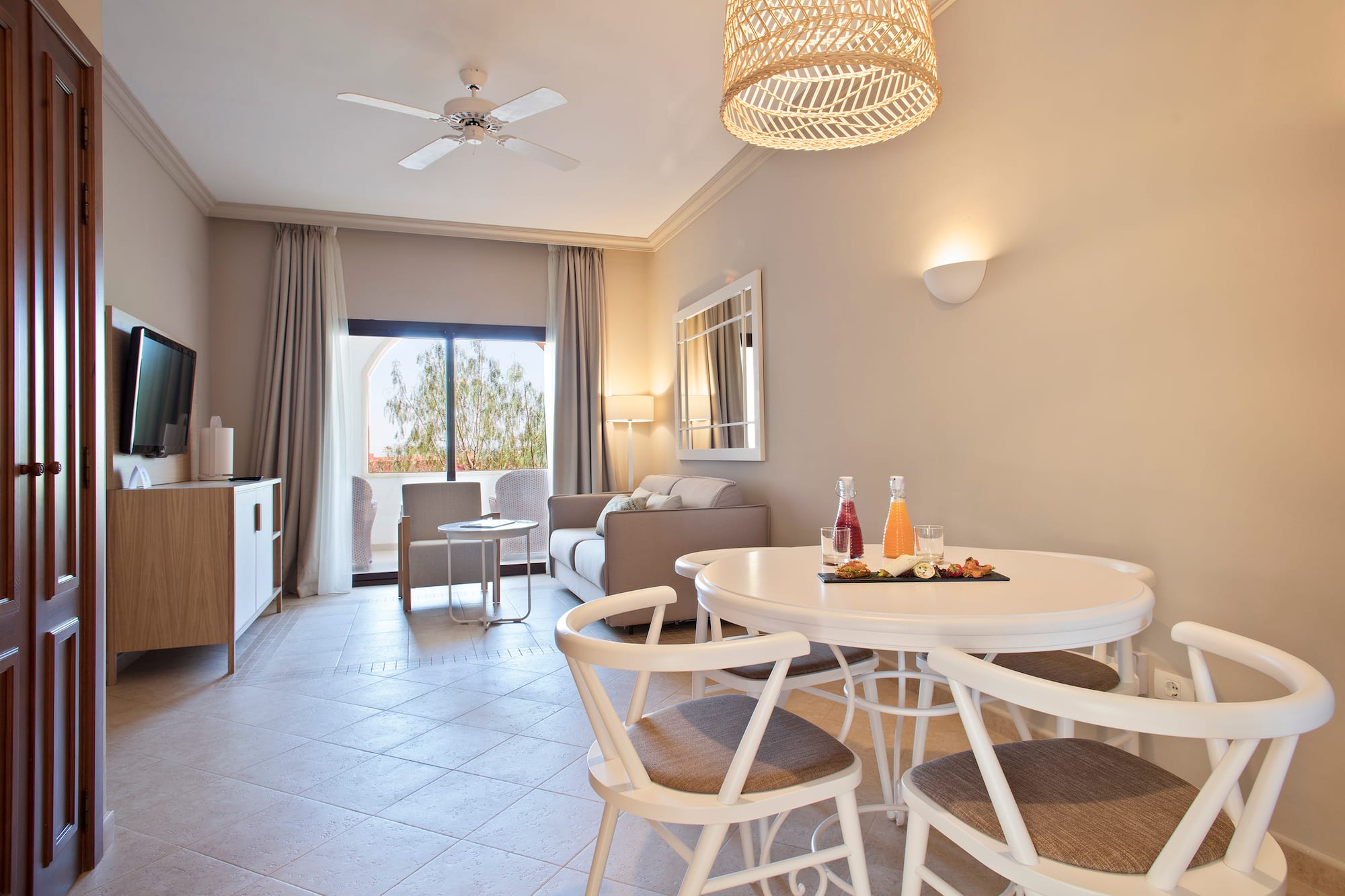 a room with a table and chairs