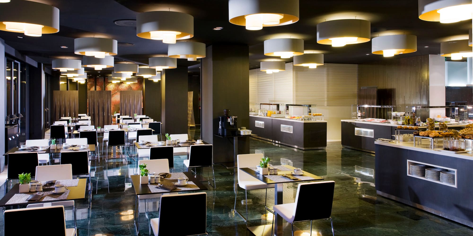 a restaurant with tables and chairs