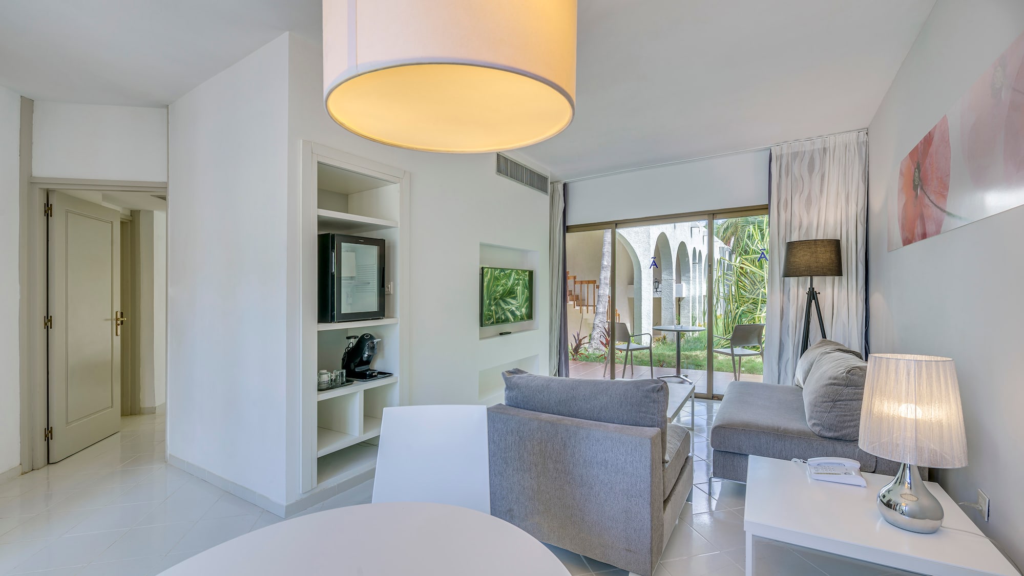 a room with a television and a couch