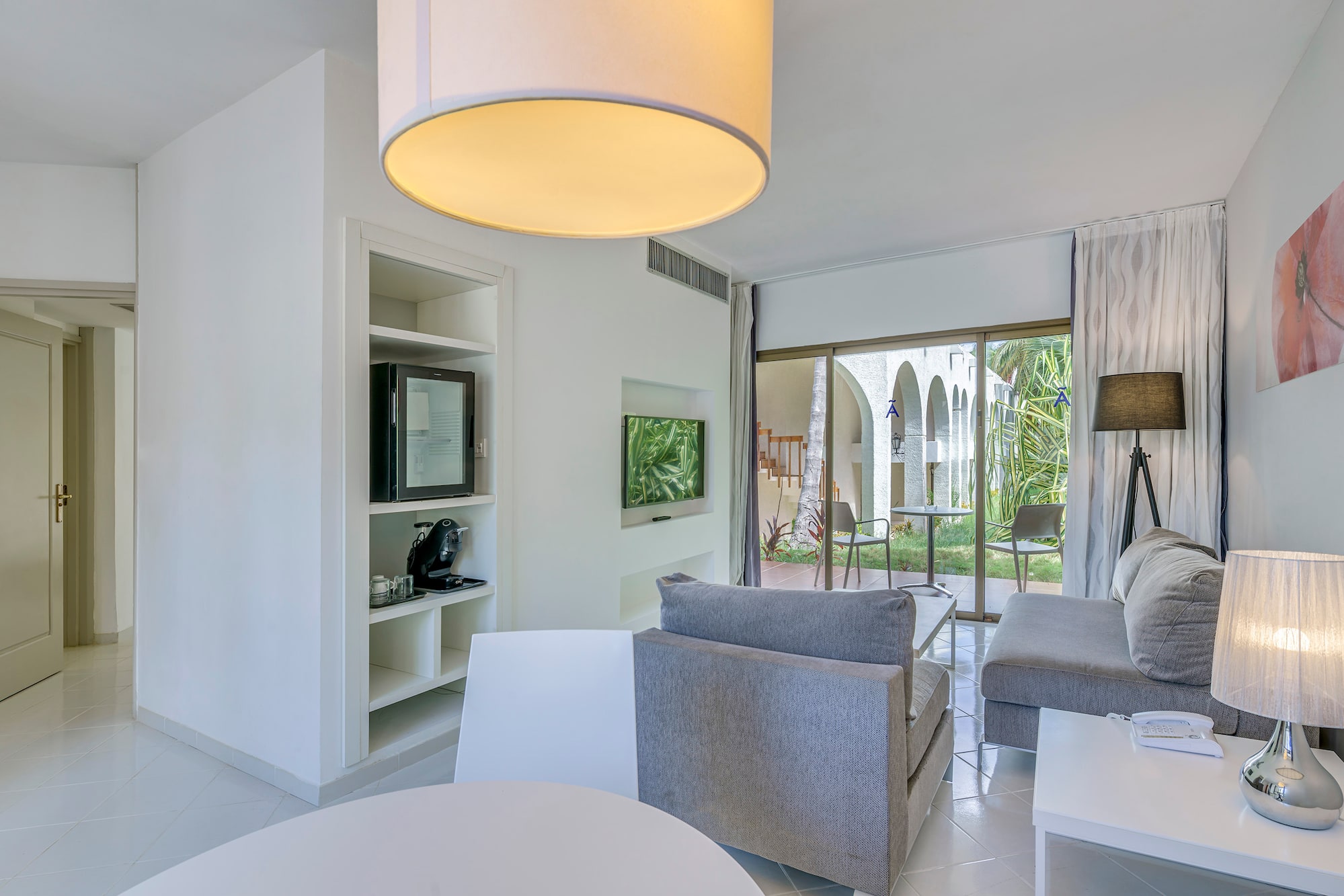 a room with a television and a couch