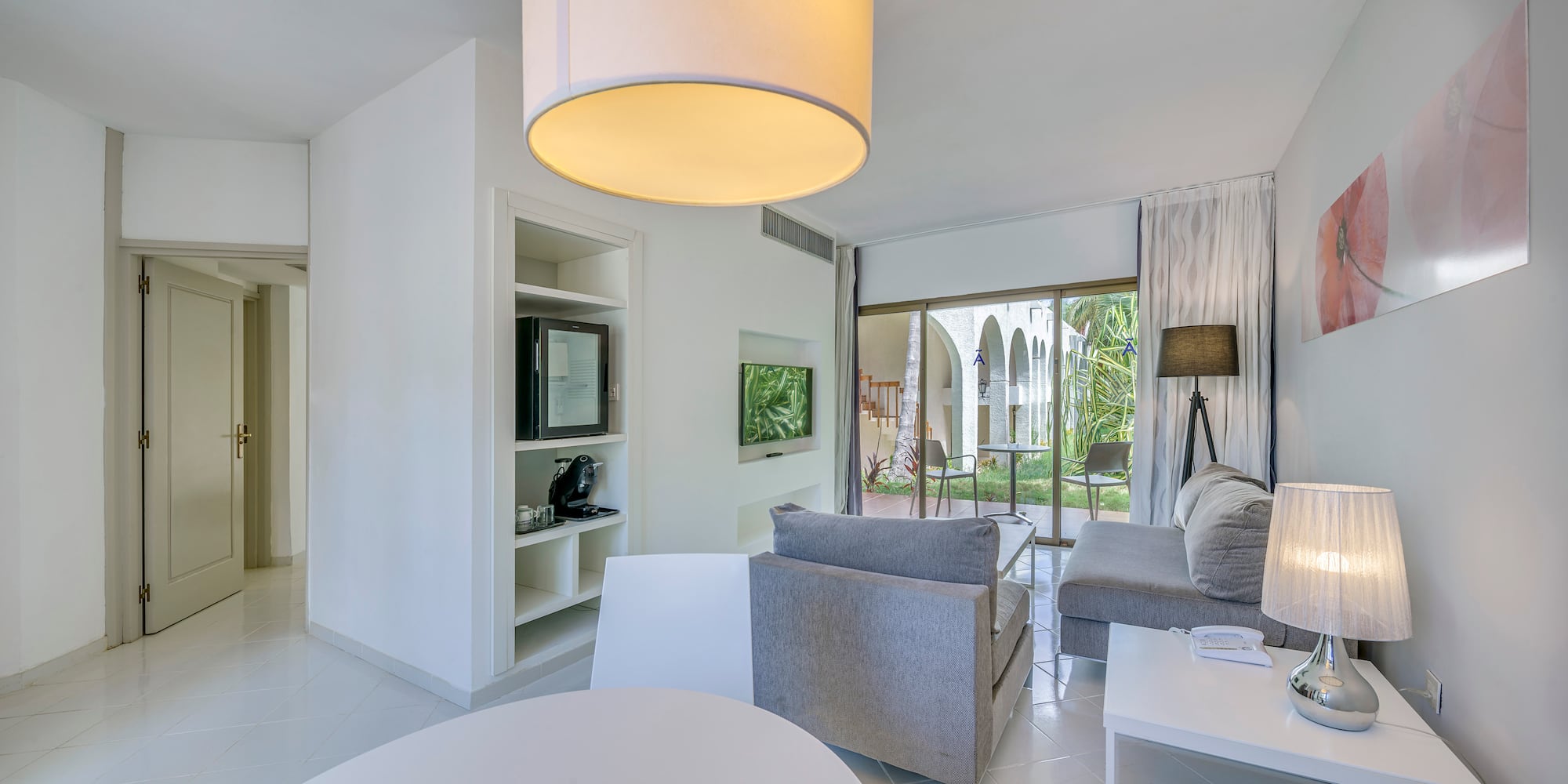 a room with a television and a couch