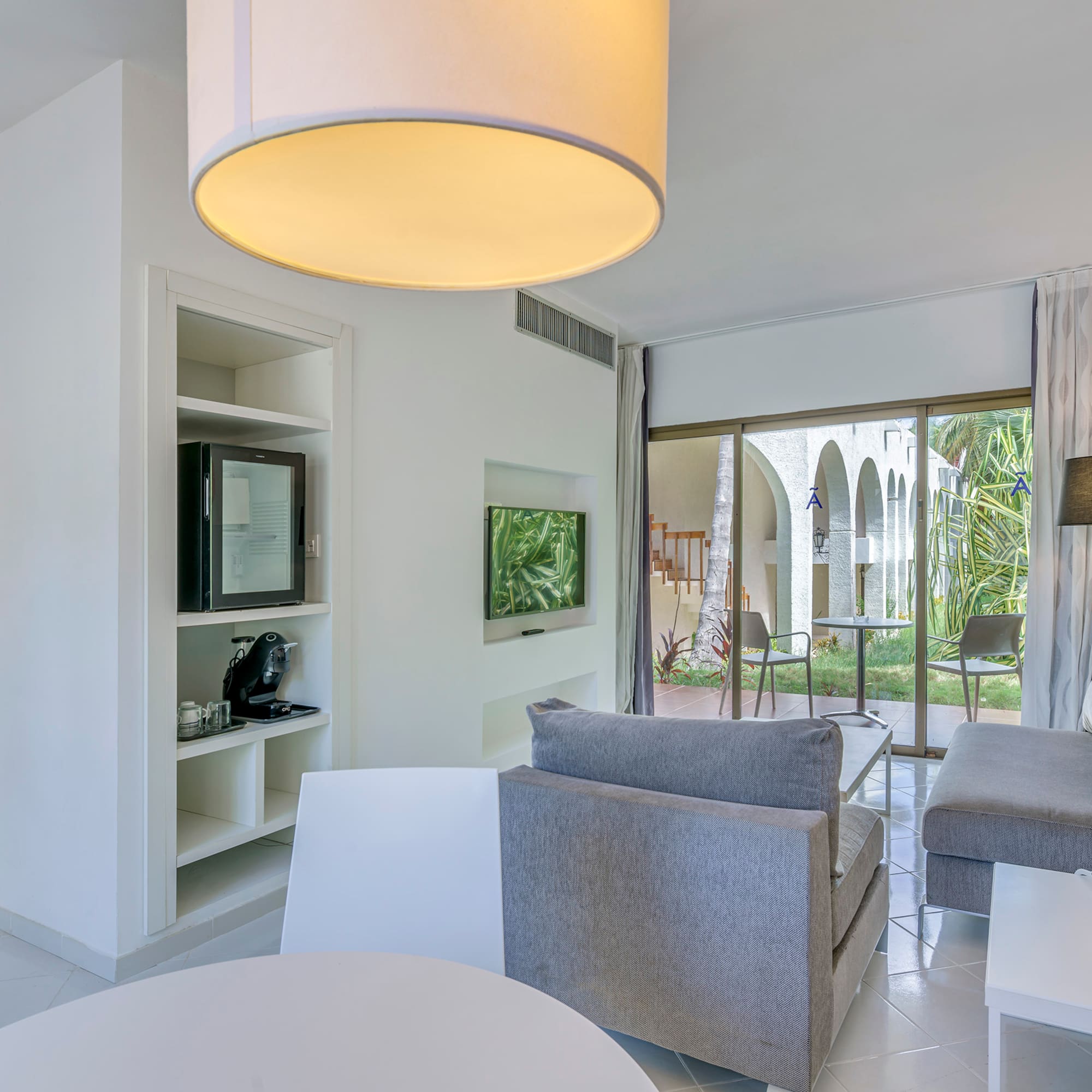 a room with a television and a couch