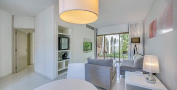 a room with a television and a couch