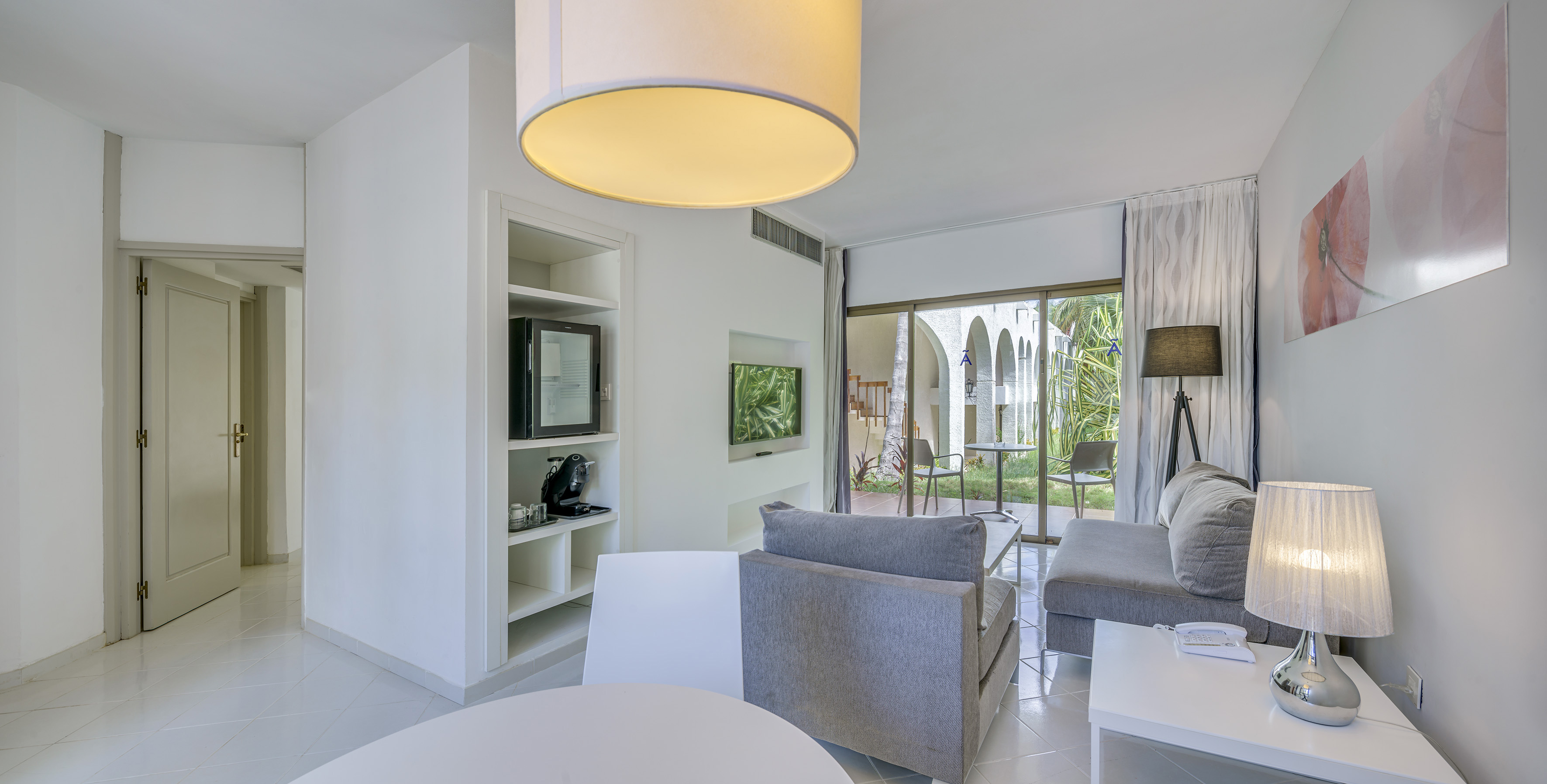 a room with a television and a couch