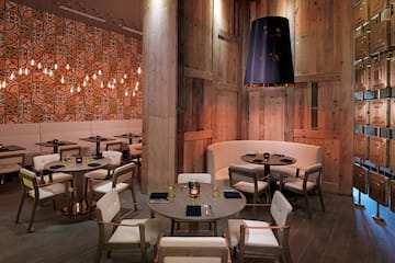 a room with tables and chairs