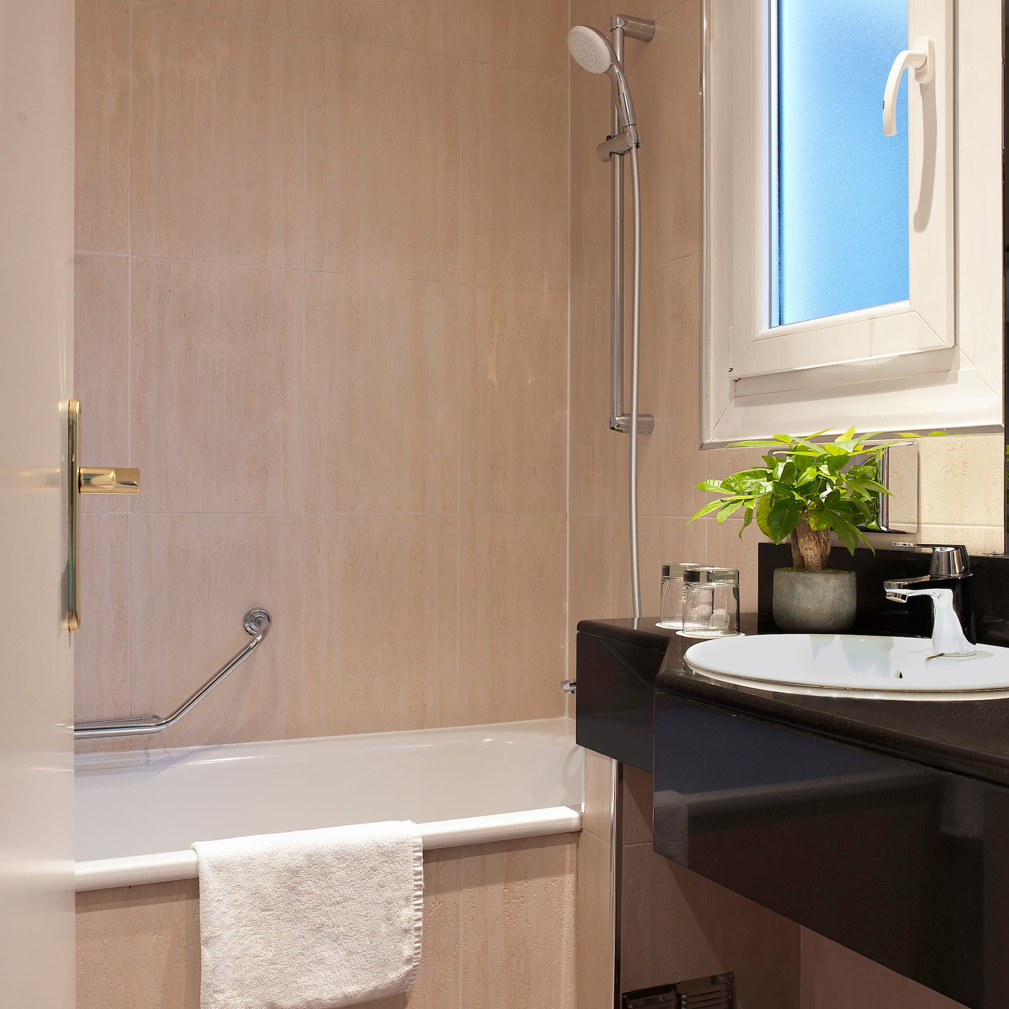 a bathroom with a sink and bathtub