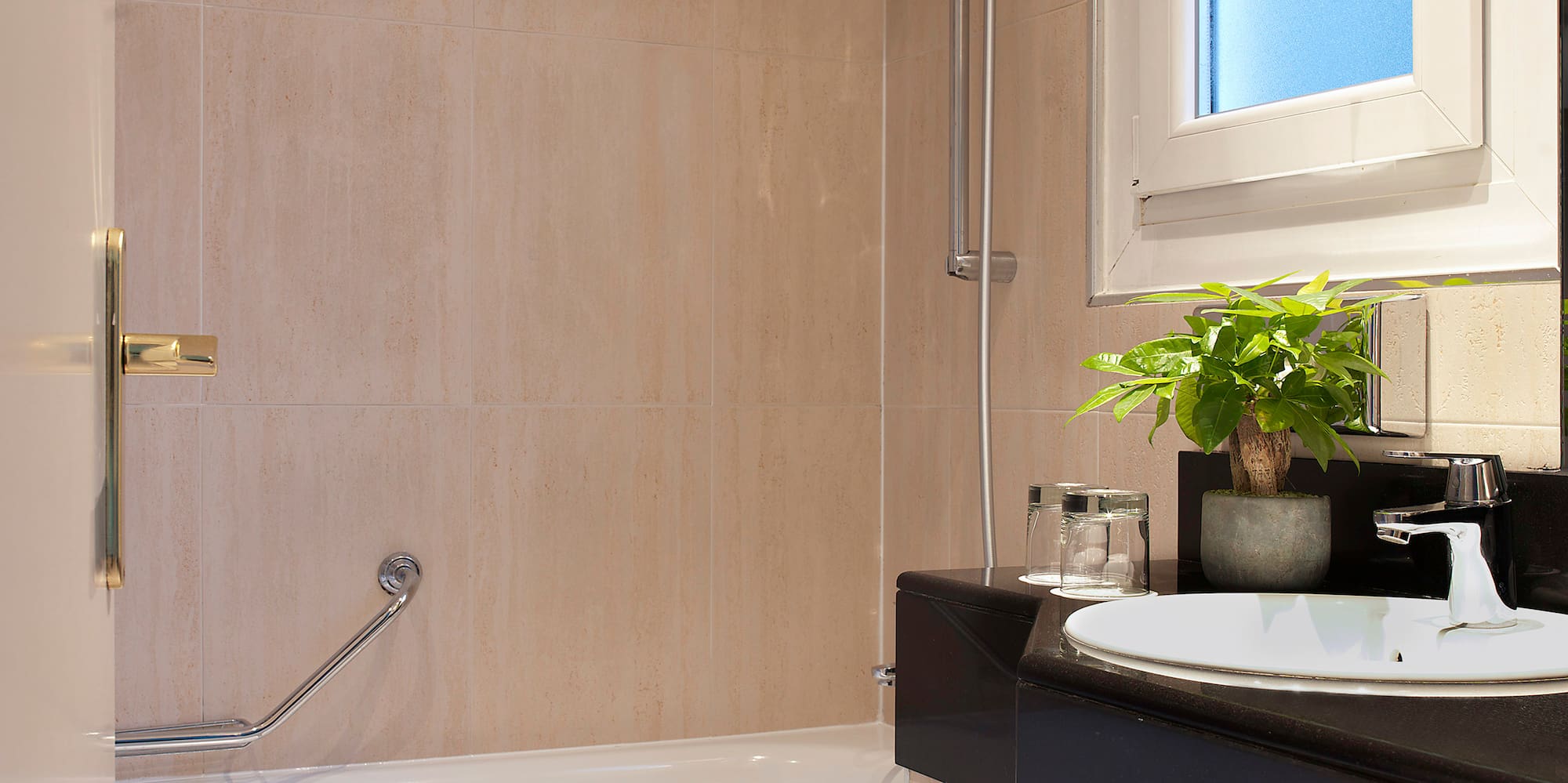 a bathroom with a sink and bathtub