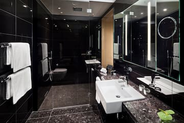 a bathroom with a sink and a shower